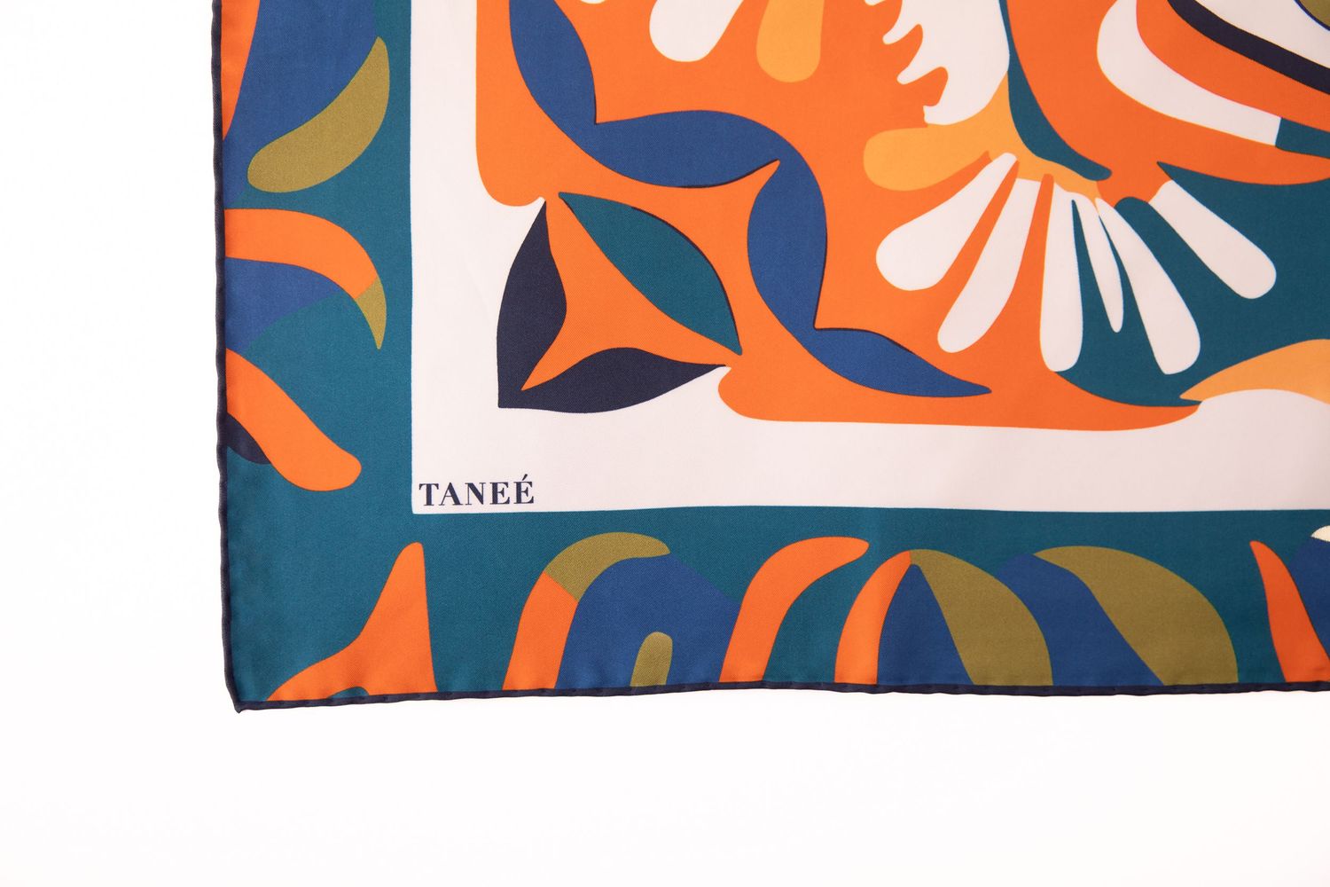Abstract pattern with organic shapes in orange, navy blue, and white creates a modern decorative design.