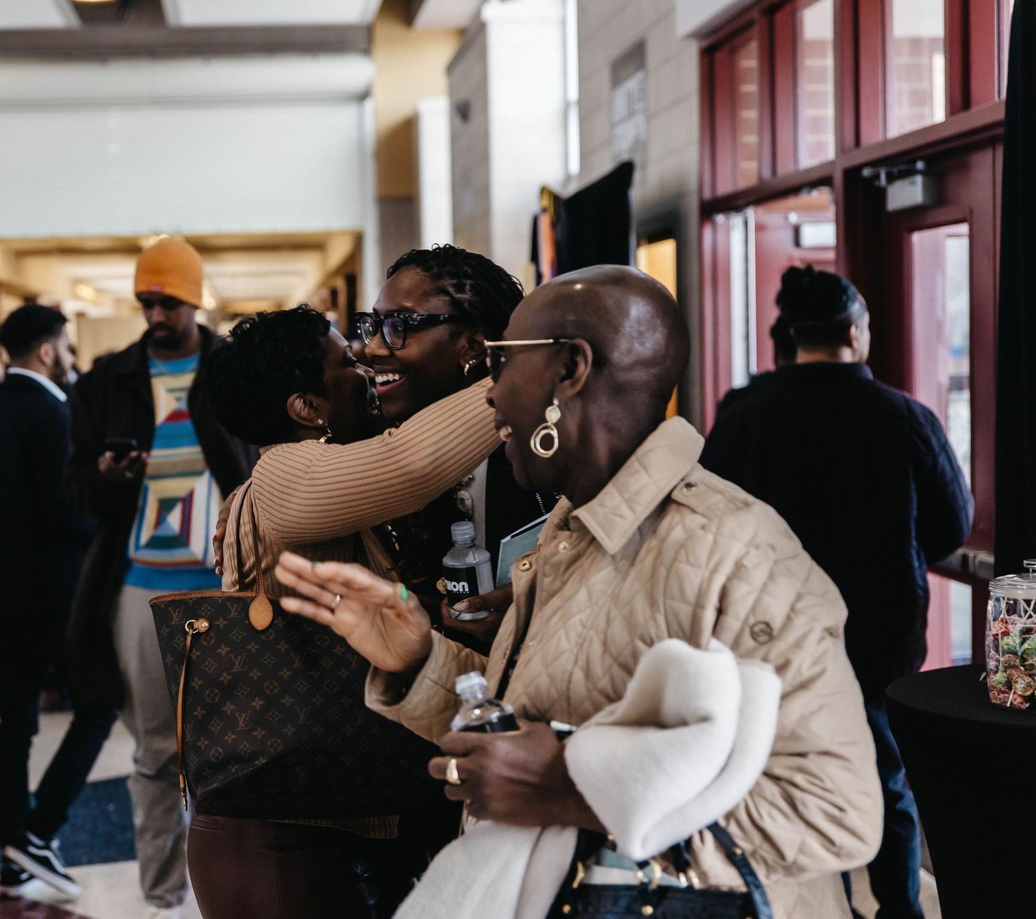 A group of people engaged in dance lessons at a studio, practicing partner dance moves together.