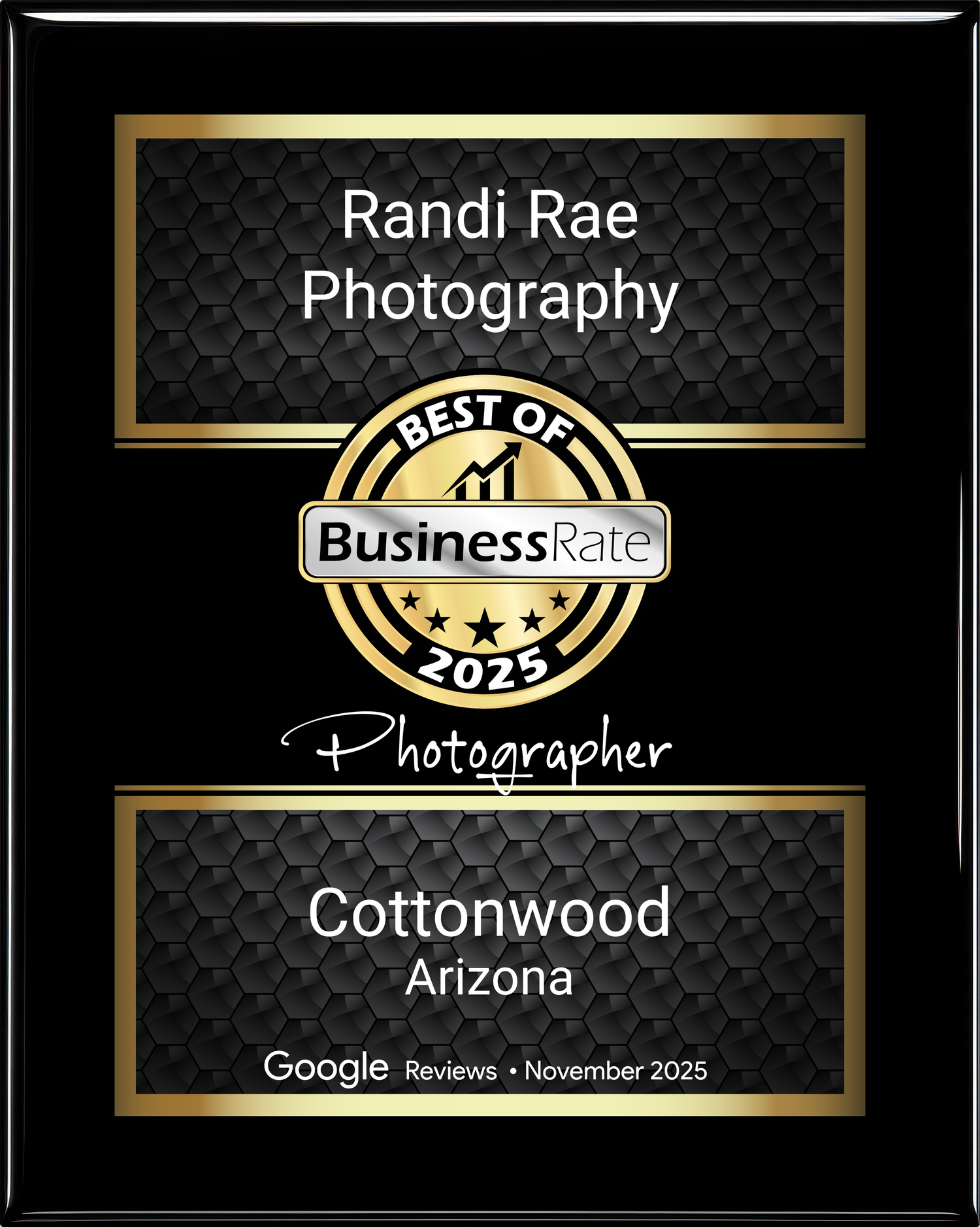 Professional photographer business logo and accolades display with gold accents and black background.