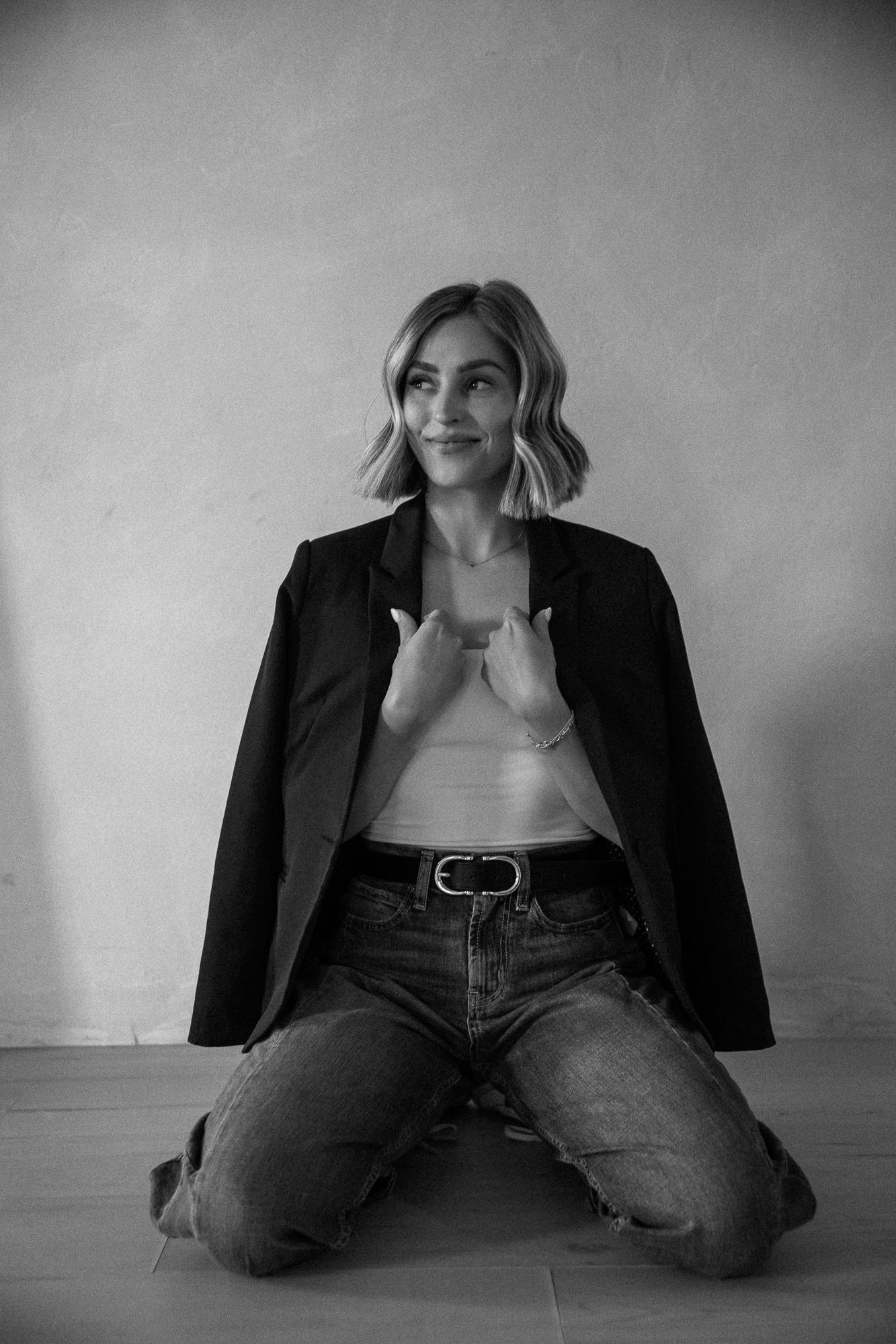 Monochrome portrait series showing relaxed poses against a light background.