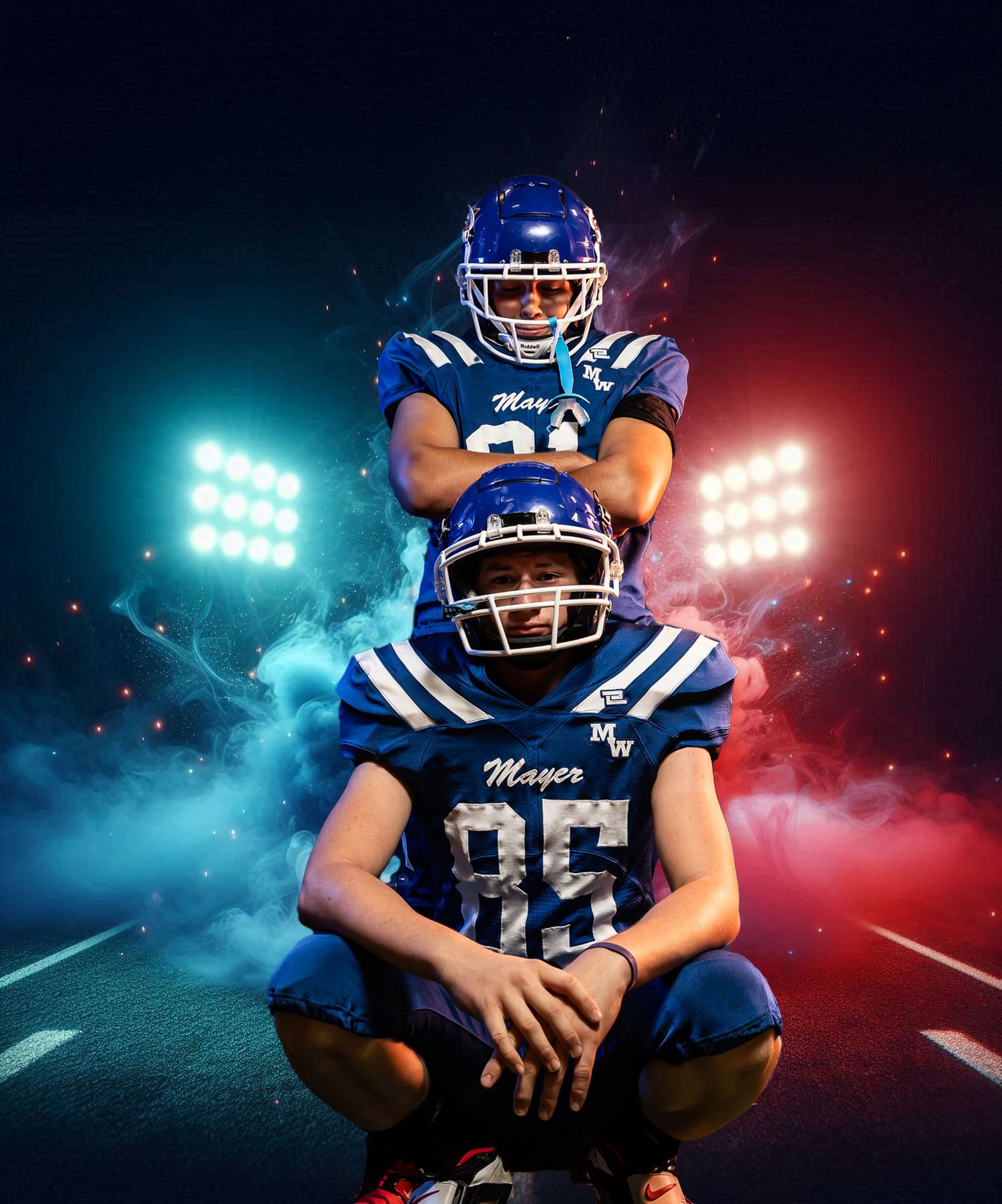 Football player in blue uniform poses dramatically with stadium lights creating atmospheric effect in background.