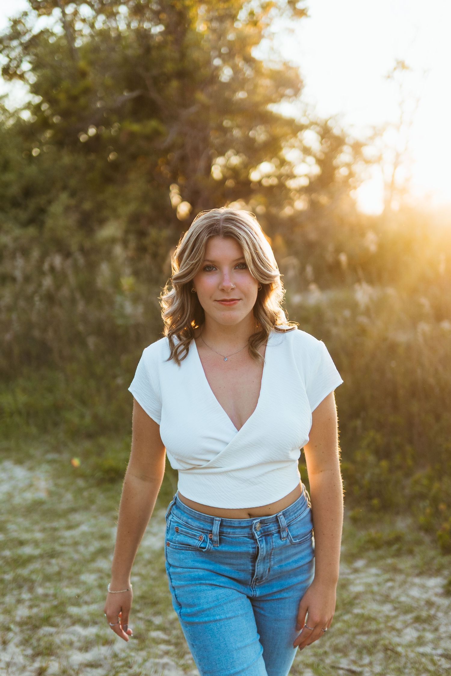 “Professional headshot outdoors in Northern Michigan, photographed with soft natural light”