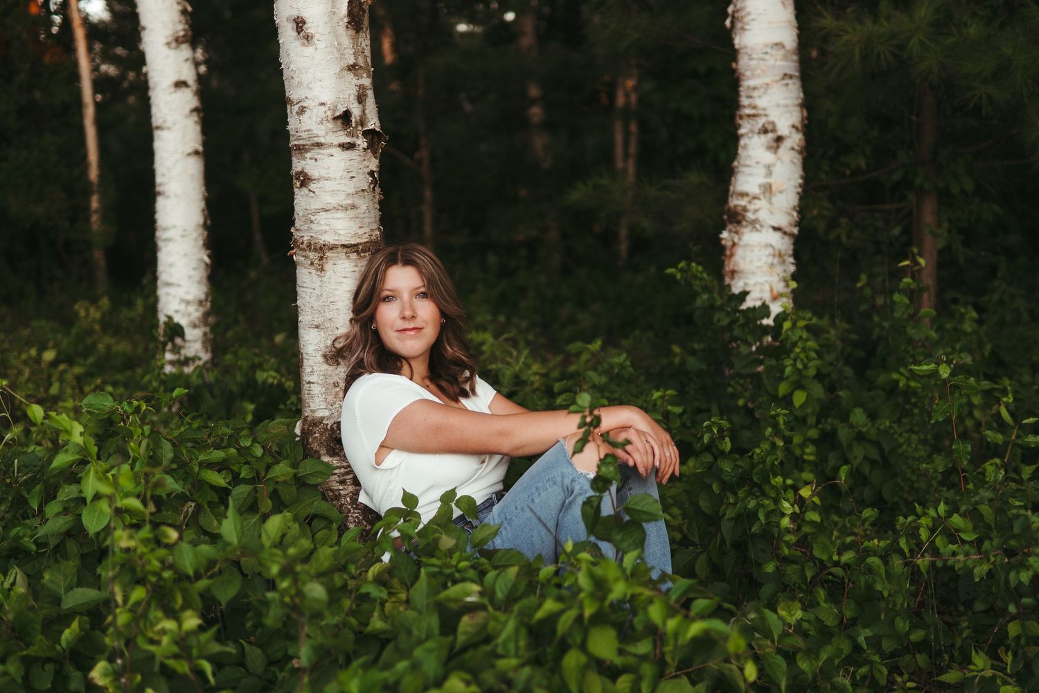 “Professional headshot outdoors in Northern Michigan, photographed with soft natural light”
