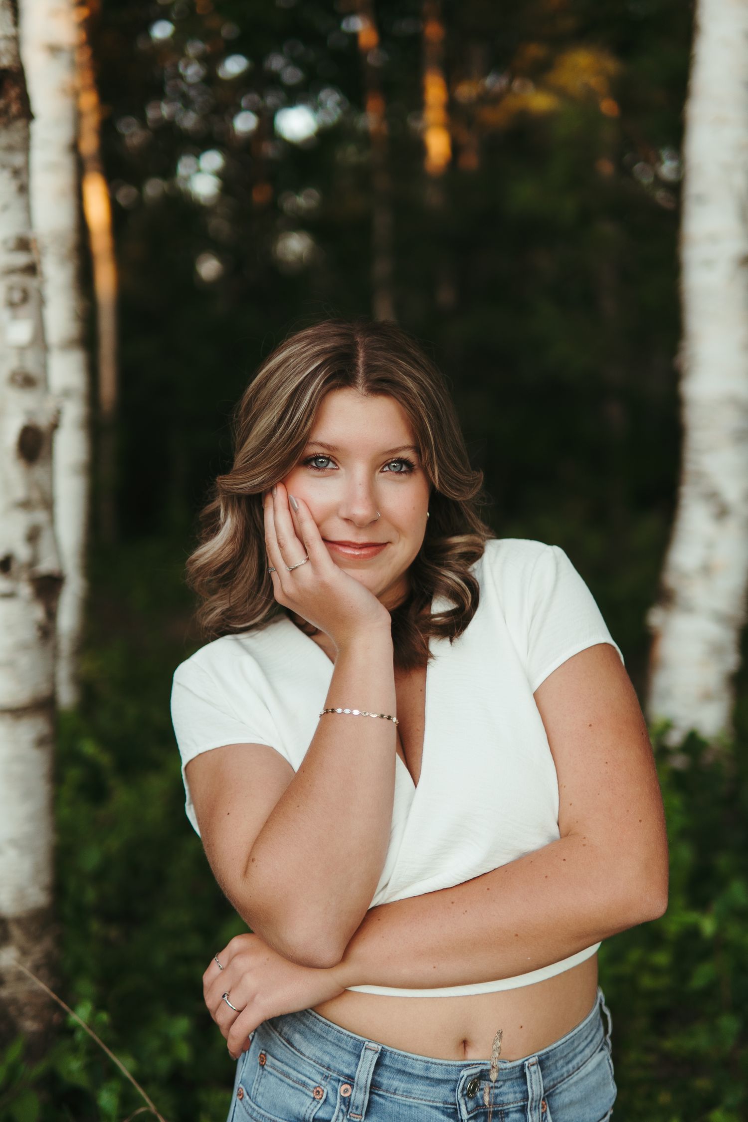 “Professional headshot outdoors in Northern Michigan, photographed with soft natural light”
