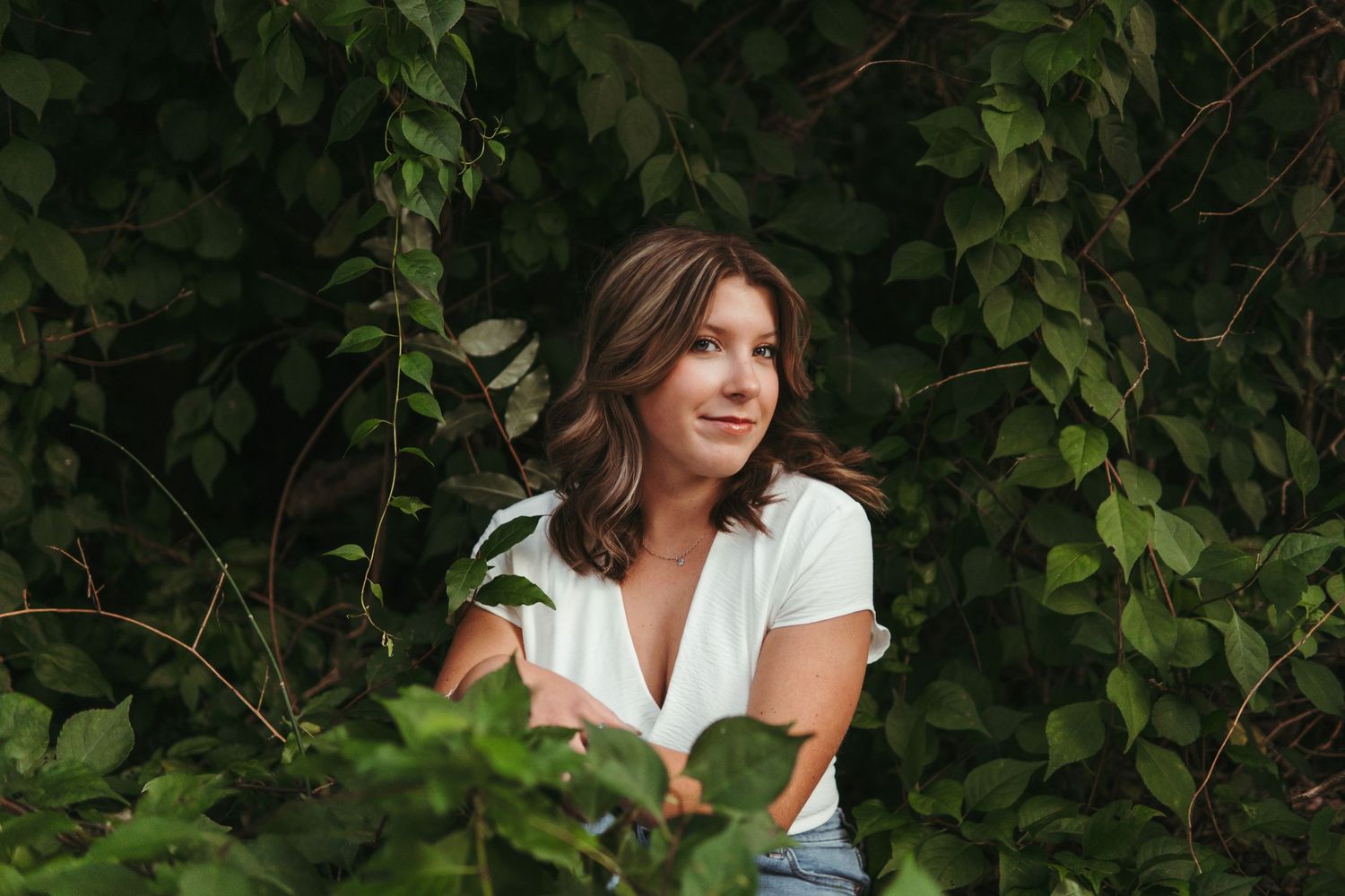 “Professional headshot outdoors in Northern Michigan, photographed with soft natural light”