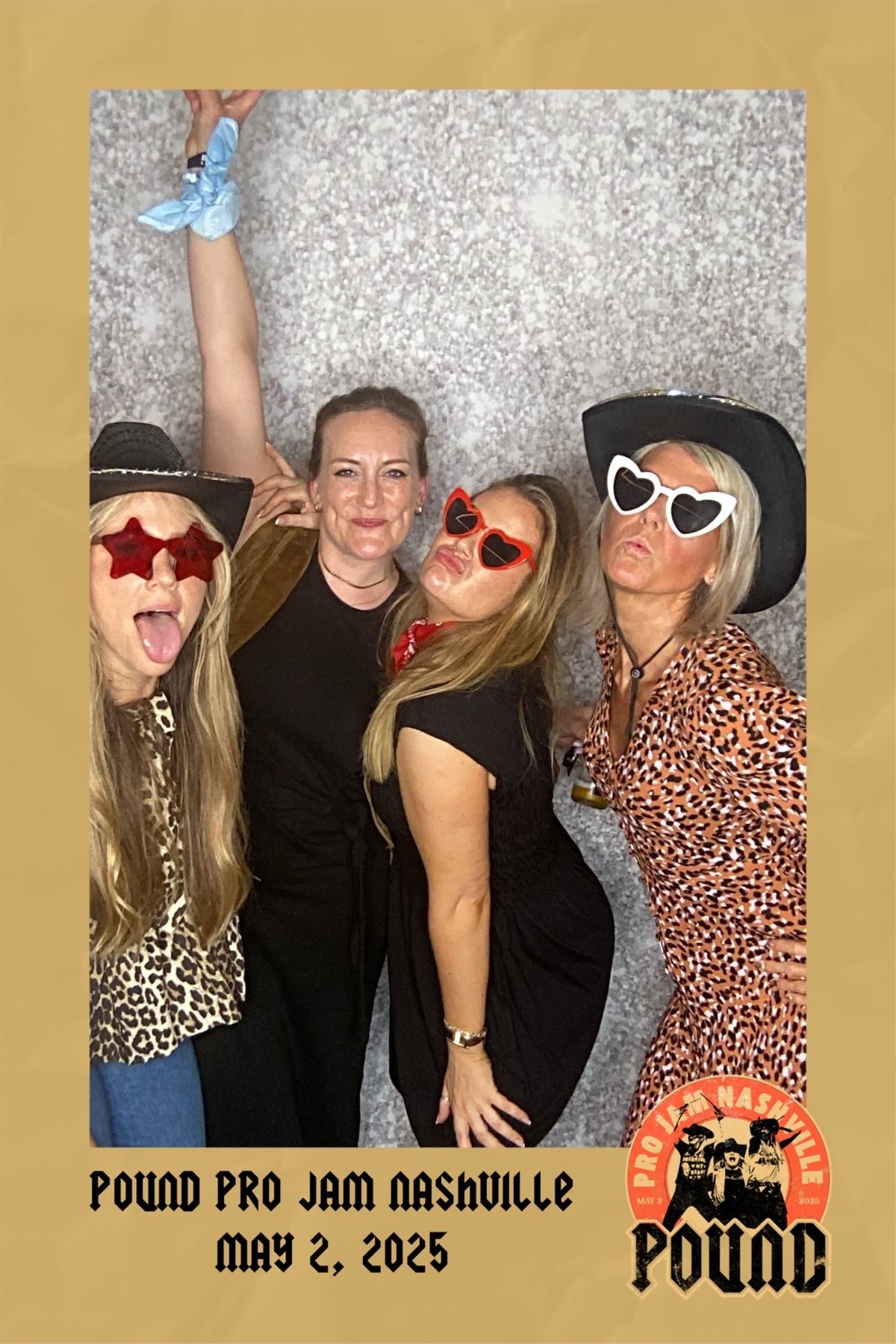 Group photo booth session with silver sparkly backdrop at Pound Pro Jam Nashville event.