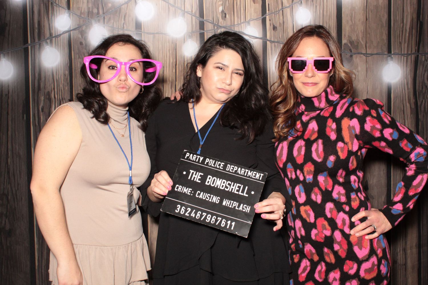 Photo booth strip showing friends posing with sunglasses and signs at a party celebration.