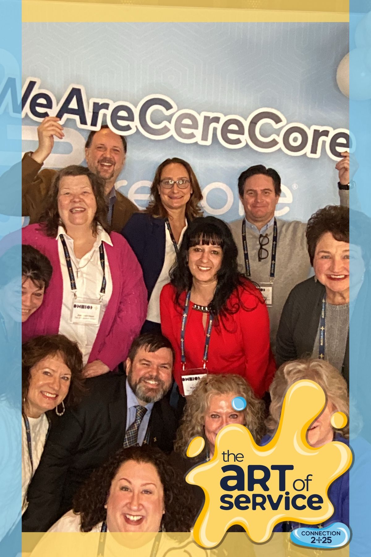 Corporate group photo of team members at CereCare event with colorful logo backdrop.