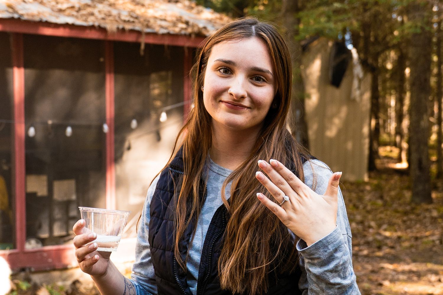 Surprise marriage proposal captured during a romantic engagement photoshoot.
