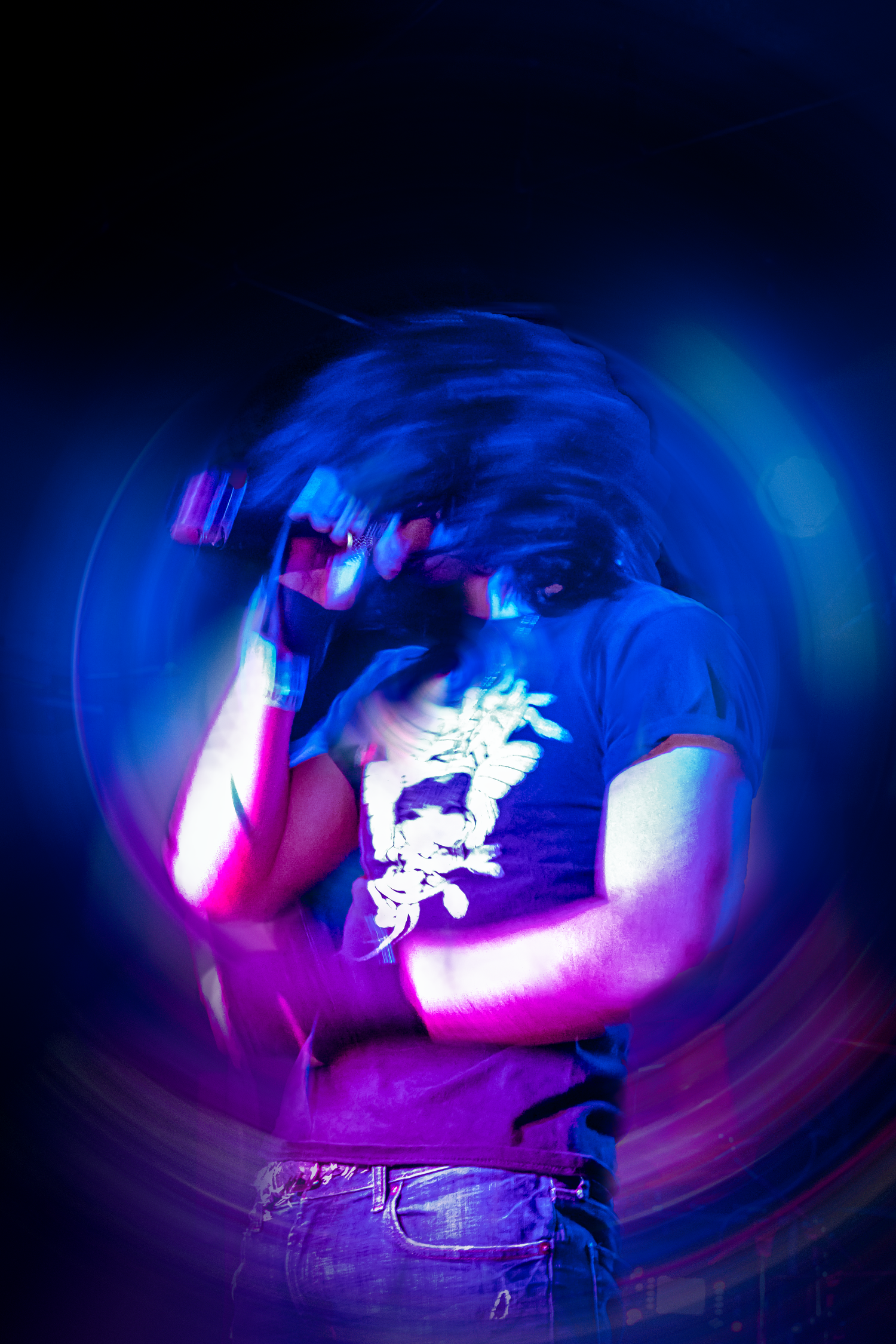 Live concert photography capturing a band performing on stage with dramatic lighting