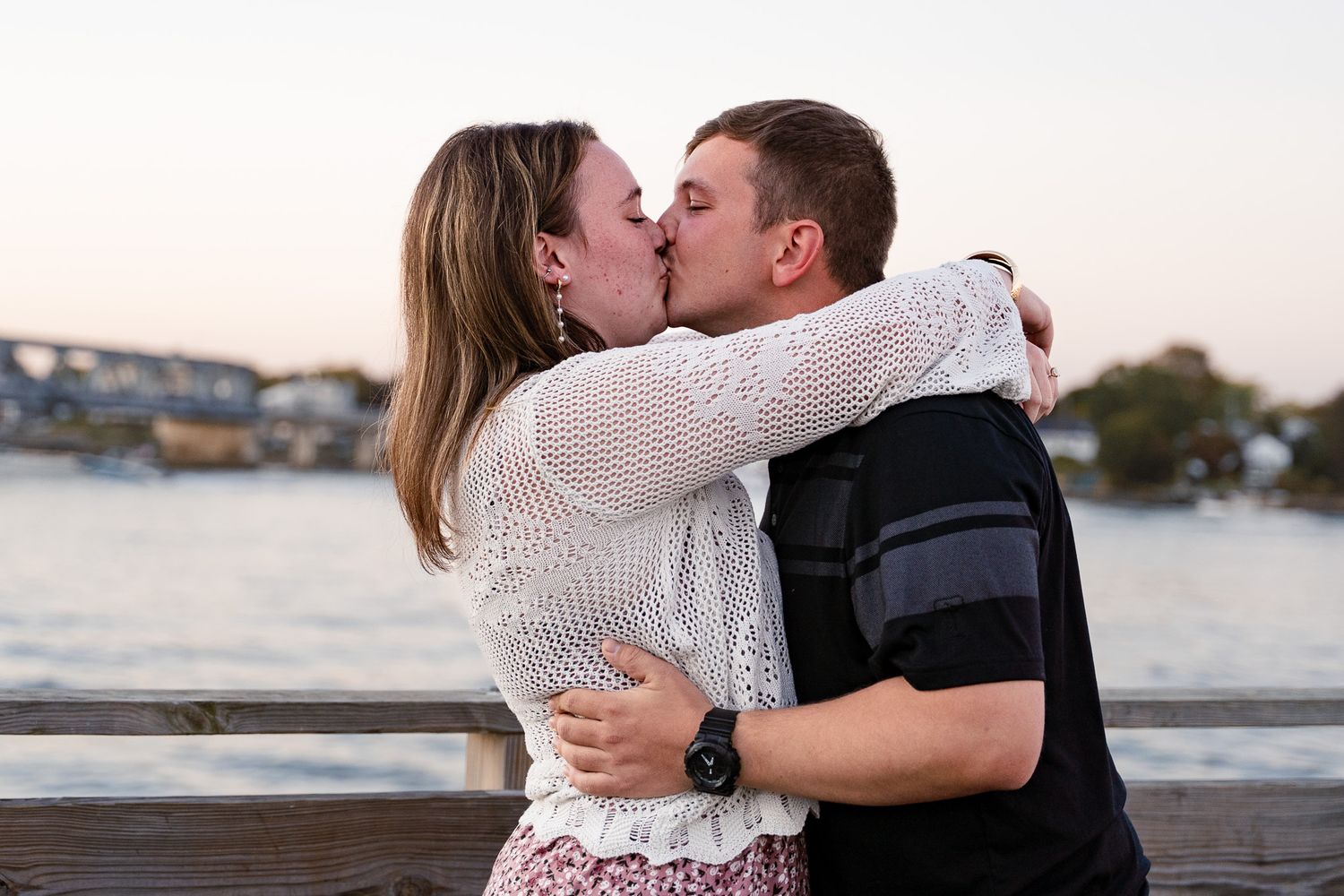Surprise marriage proposal captured during a romantic engagement photoshoot.