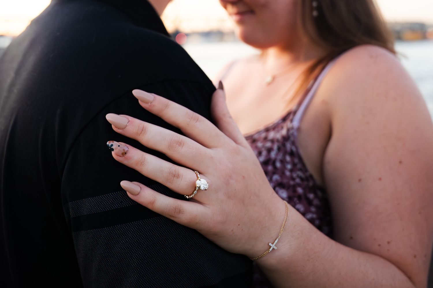 Surprise marriage proposal captured during a romantic engagement photoshoot.
