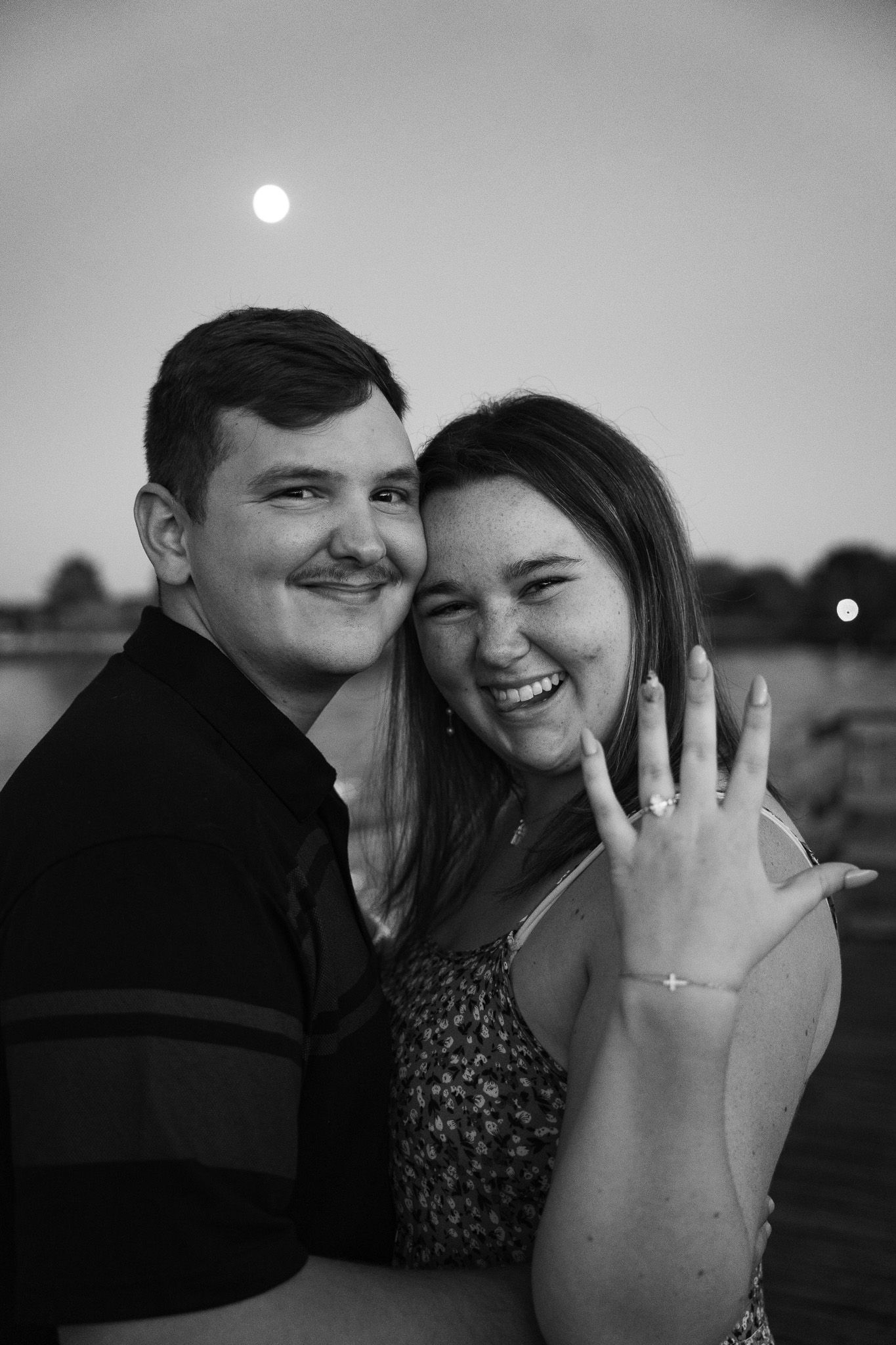 Couple embracing during a scenic engagement photo session