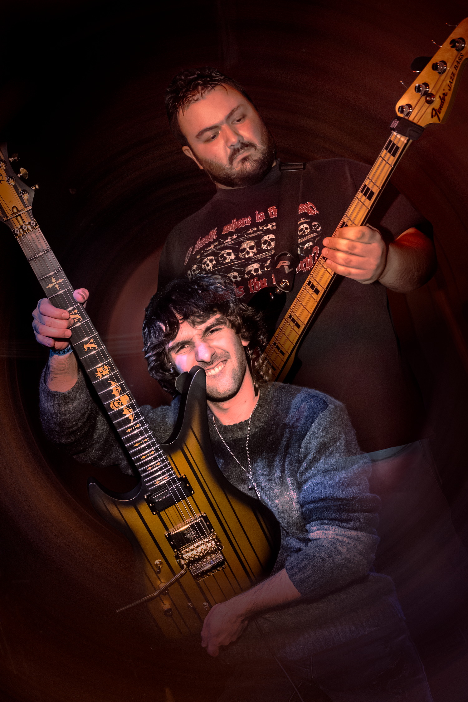 Live concert photography capturing a band performing on stage with dramatic lighting