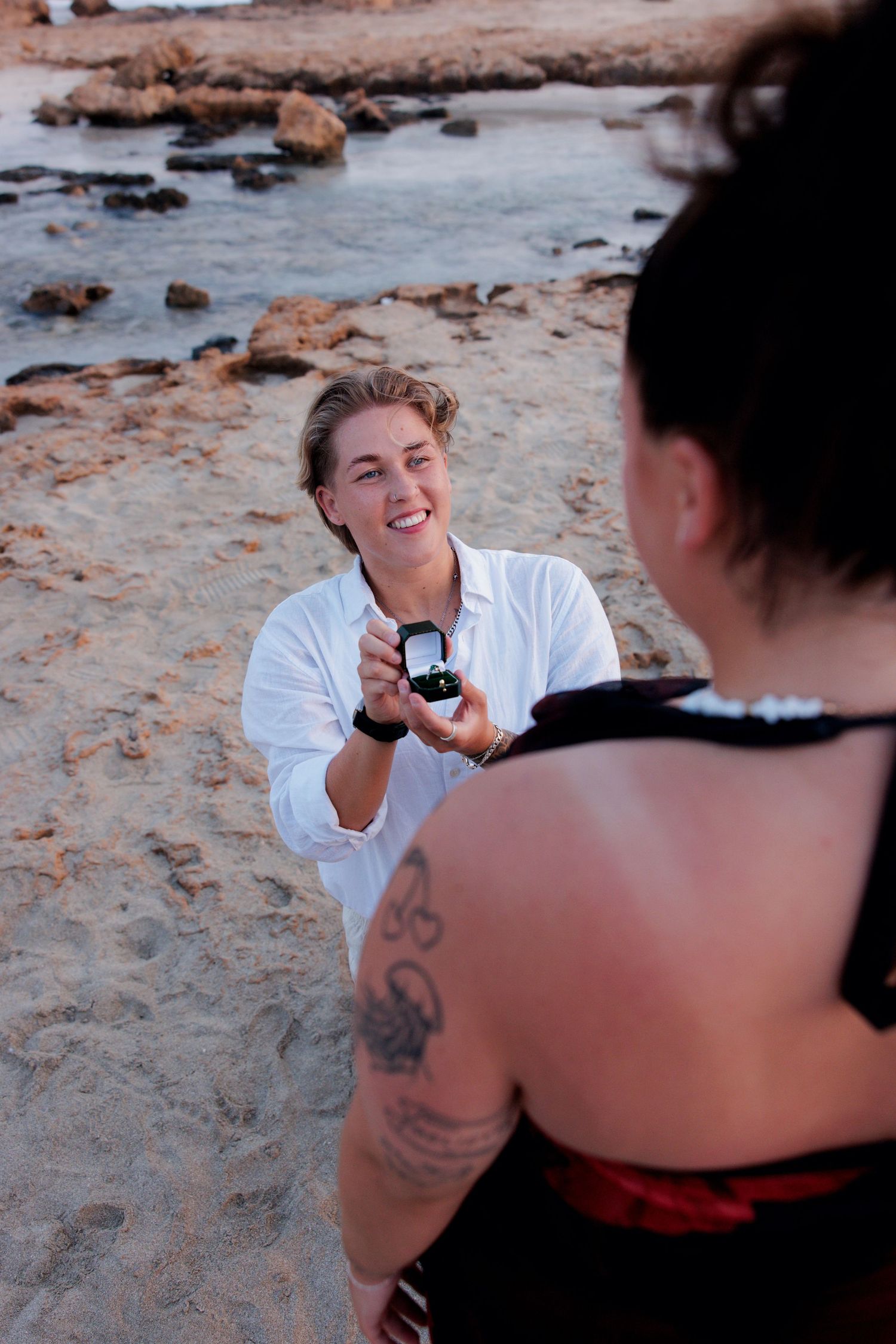 Couple proposing on a beach in Cyprus during a secret engagement photoshoot