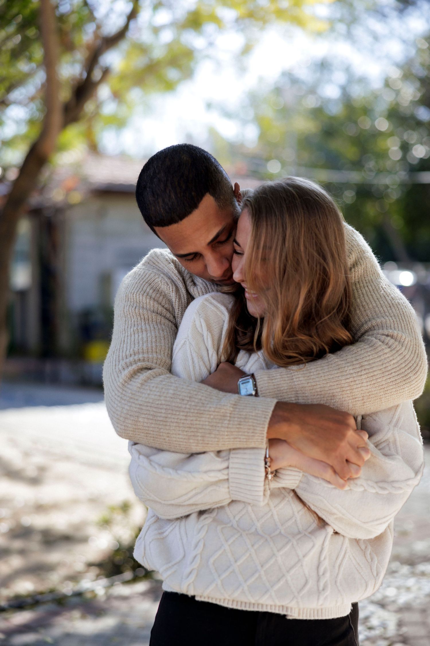Couple hugging in a park in Nicosia Cyprus during a love story photoshoot
