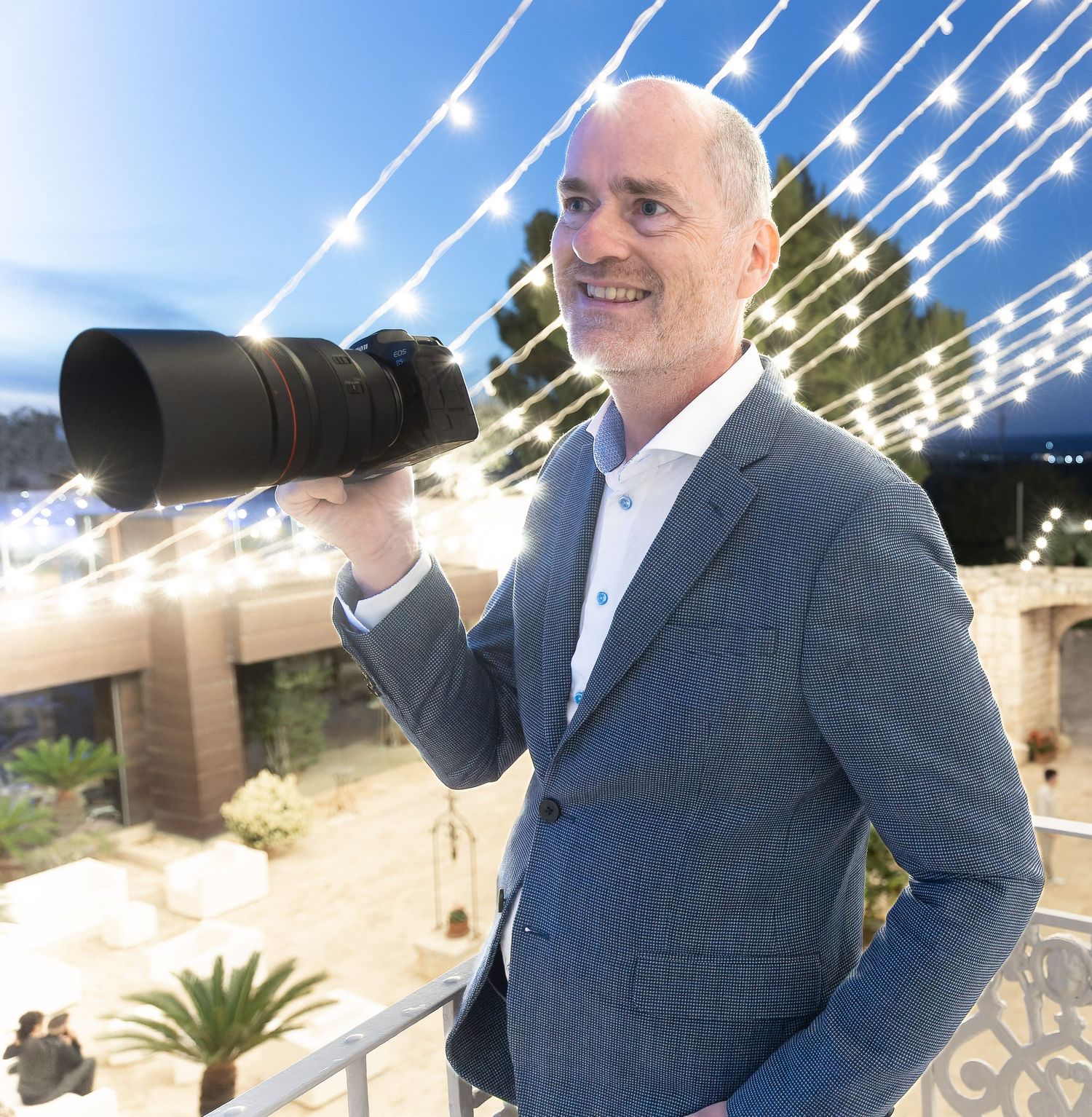 Sussex wedding photographer in action | Taking photo at destination wedding in Italy.