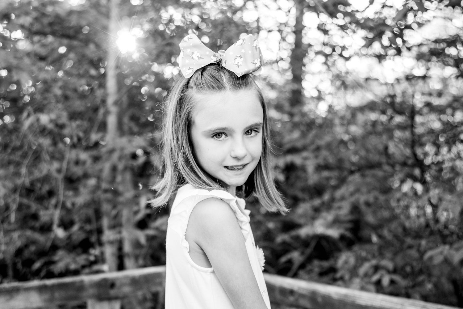 Black and white outdoor family portraits in a natural setting.