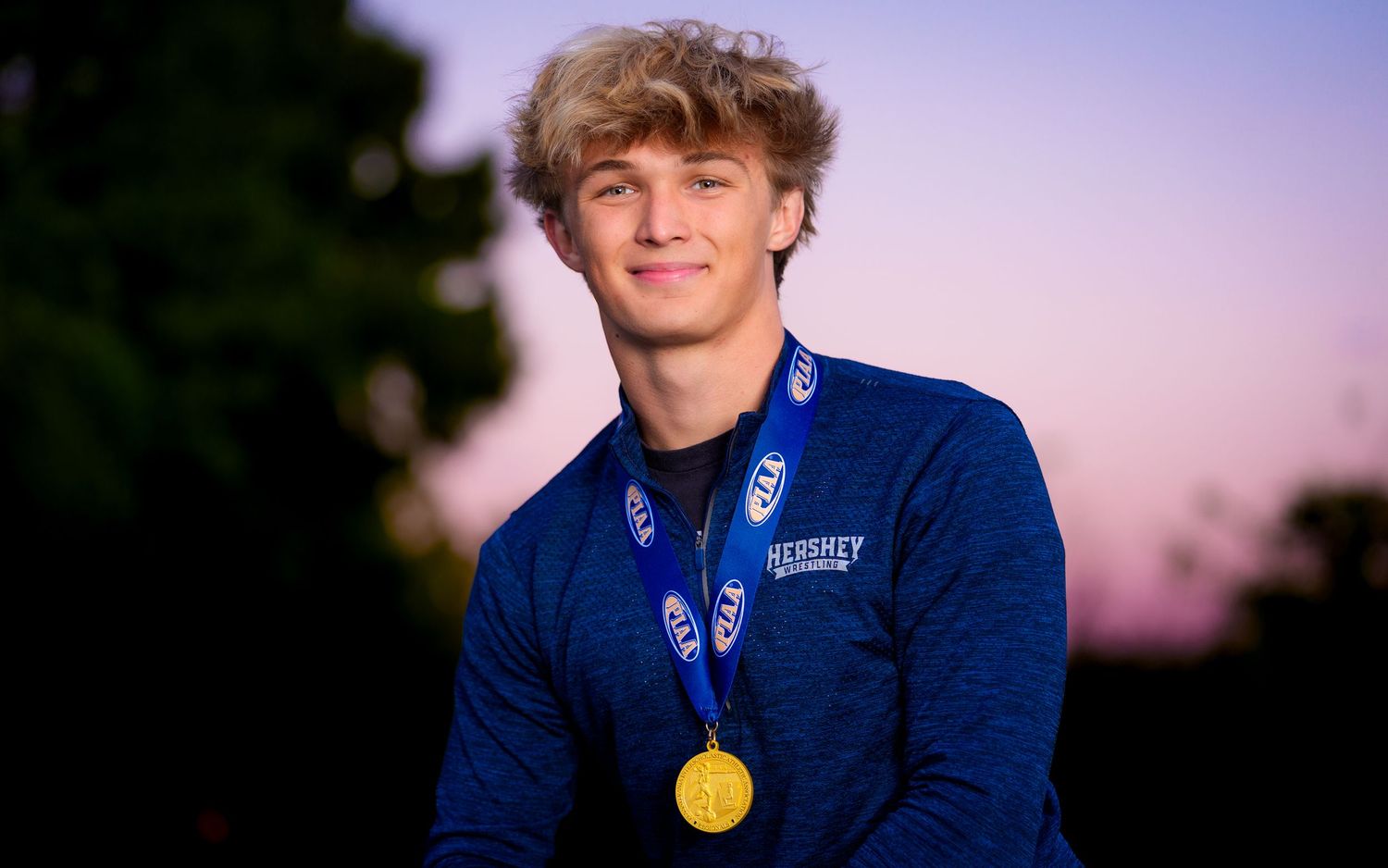 High school senior Sportrait with gold medal, by Deanna Fox, SportsFox Photography, Hershey PA