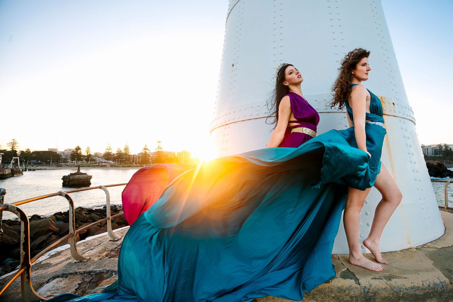 Wollongong Flying Dress Photographer. Women in Flying Dresses at Wollongong Breakwater Lighthouse