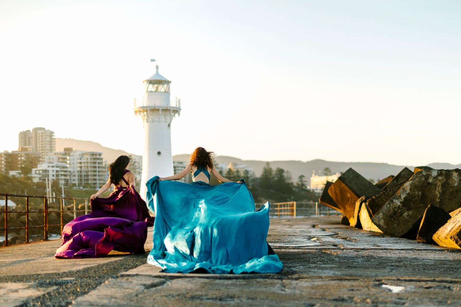 Wollongong Flying Dress Photographer. Women in Flying Dresses at Wollongong Breakwater Lighthouse