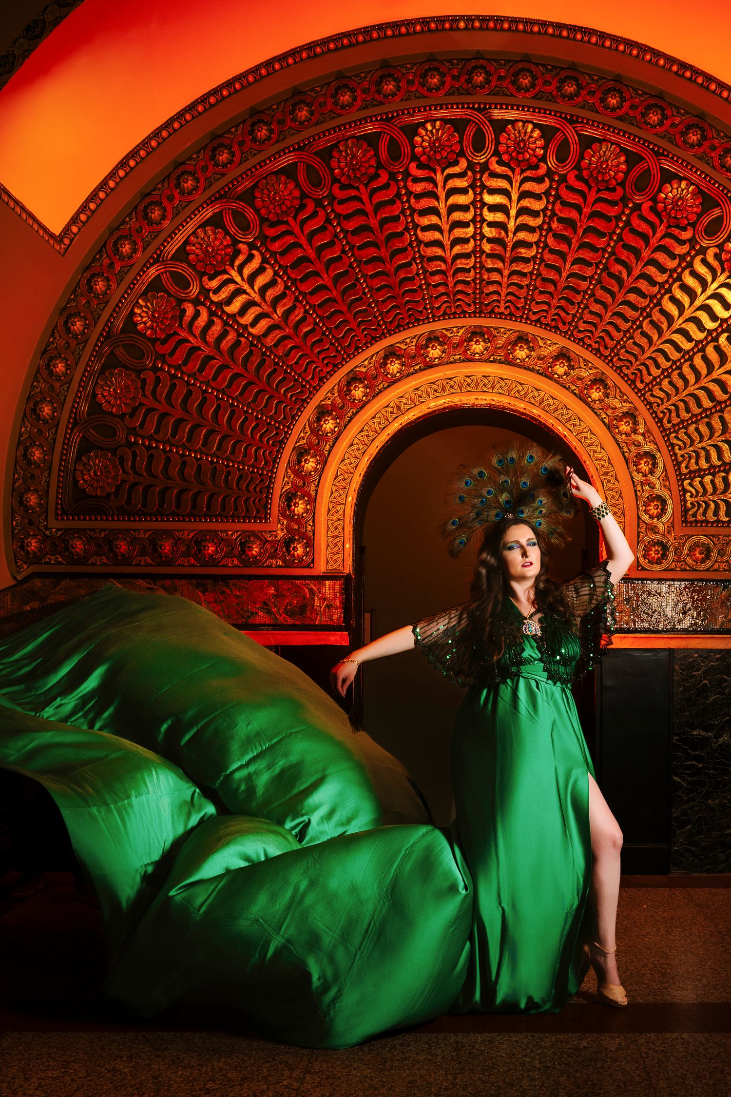 Wollongong Flying Dress Photographer. Woman in green Flying Dress beneath an Art Deco arch at St Louis Union Station Hotel.