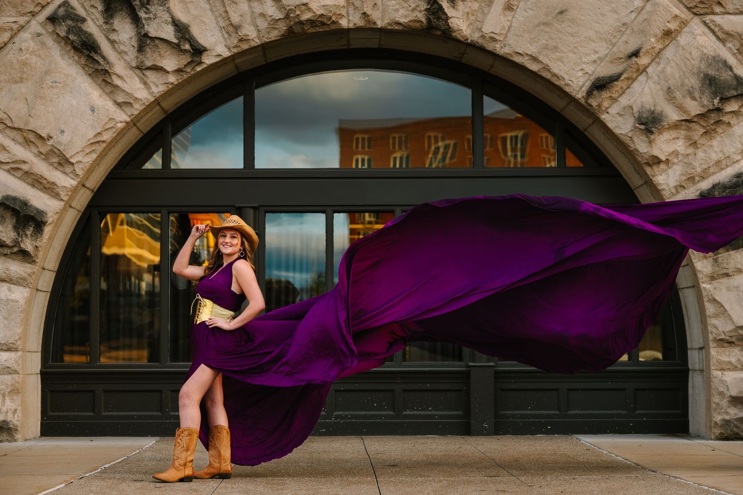 Wollongong Flying Dress Photographer. Woman in Plum Flying Dress at St Louis Union Station Hotel.