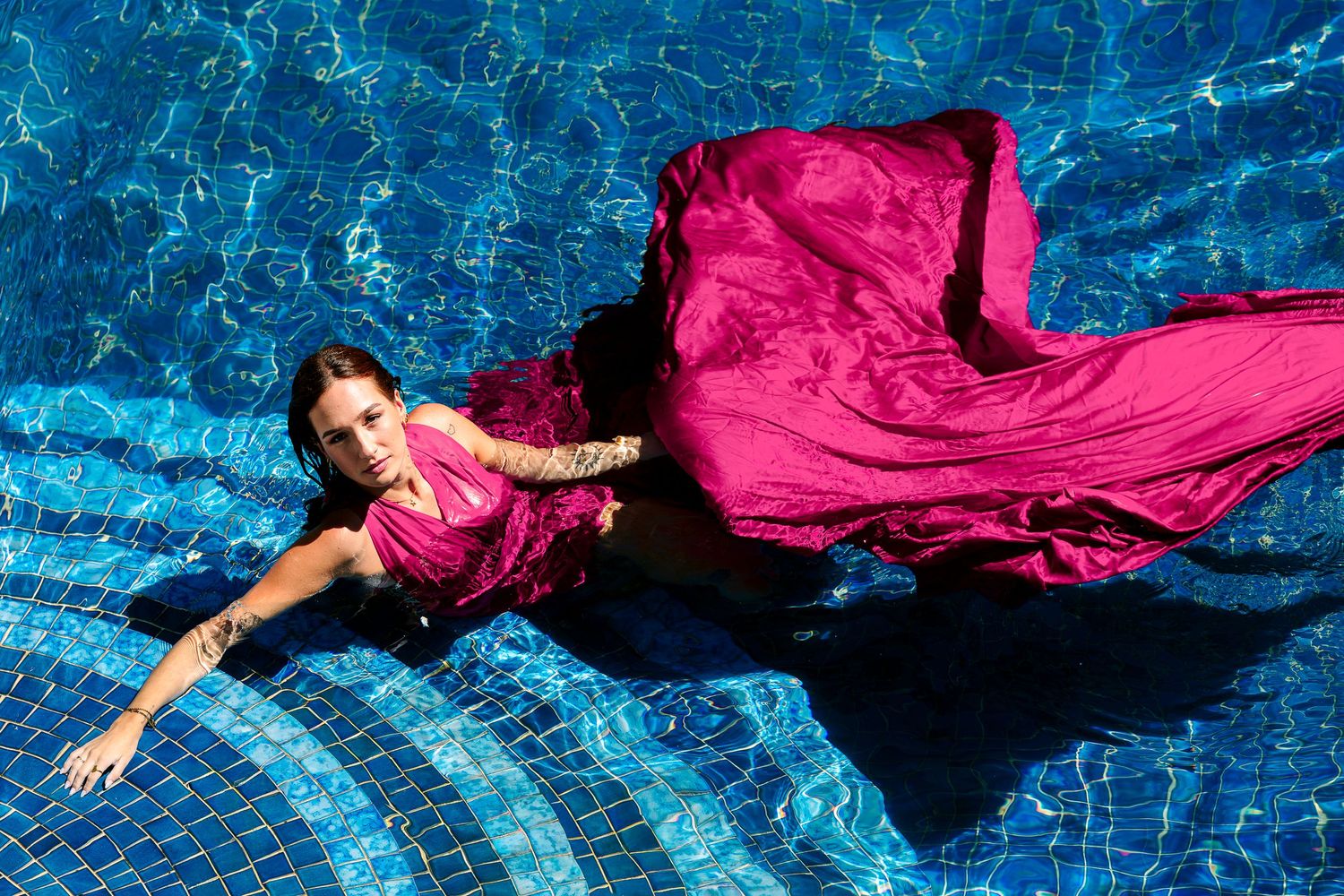 Creative coastal portrait in a flying dress photographed in Wollongong.