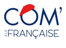 Red and blue text logo design with 'COM' in large letters.