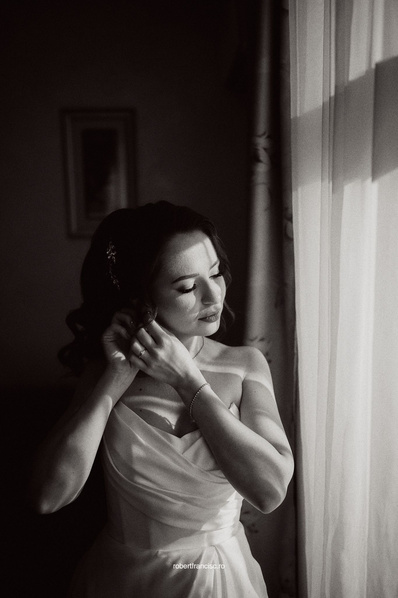 A black and white photo sequence shows someone in a white dress adjusting their hair by a window in dramatic lighting.