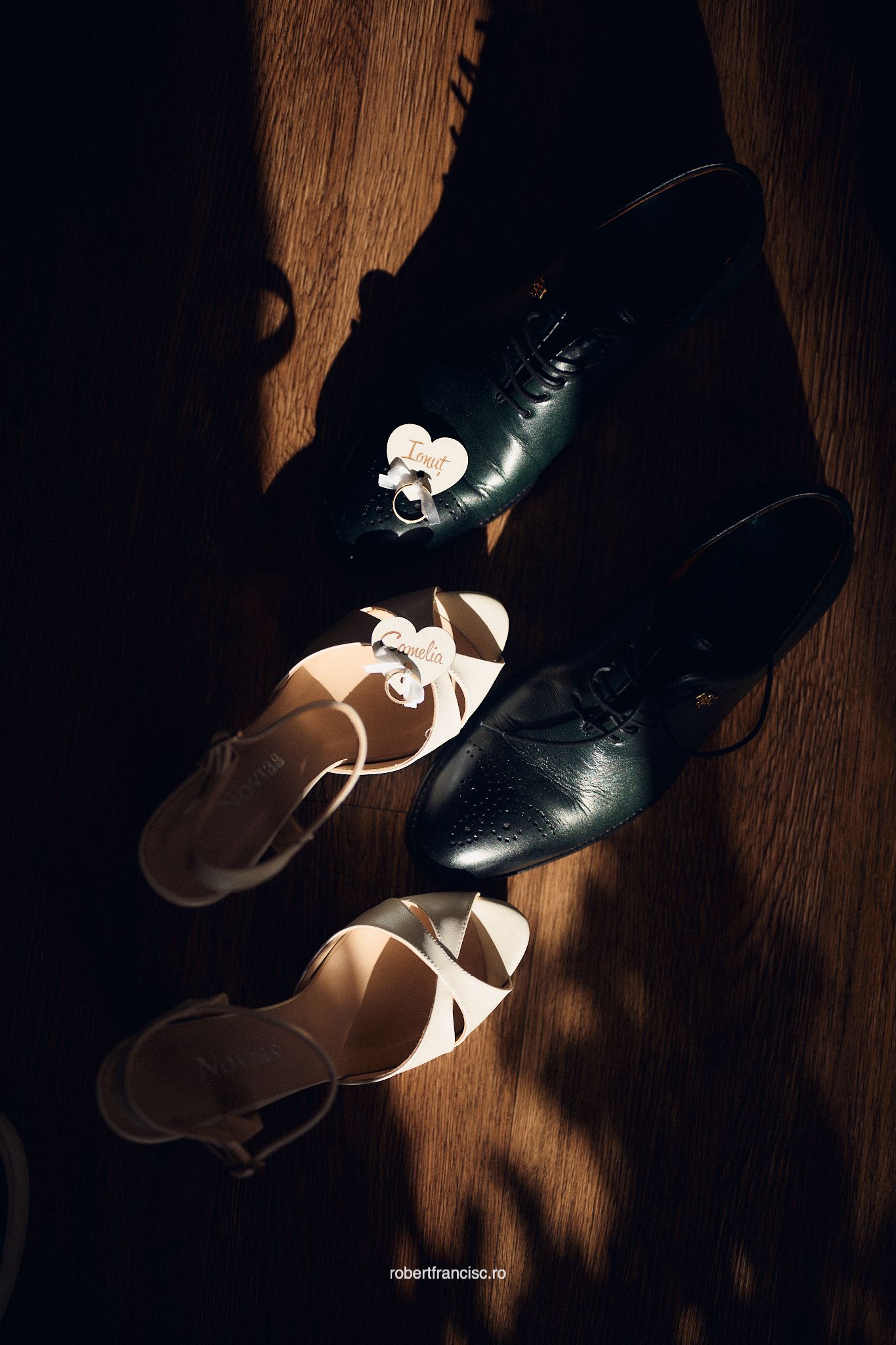 A sequence of artistic photos showing black and white dance shoes in dramatic lighting against a wooden floor.