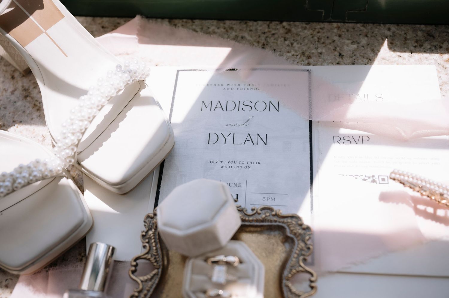 A series of table place cards featuring elegant script lettering and classic name card designs in white.
