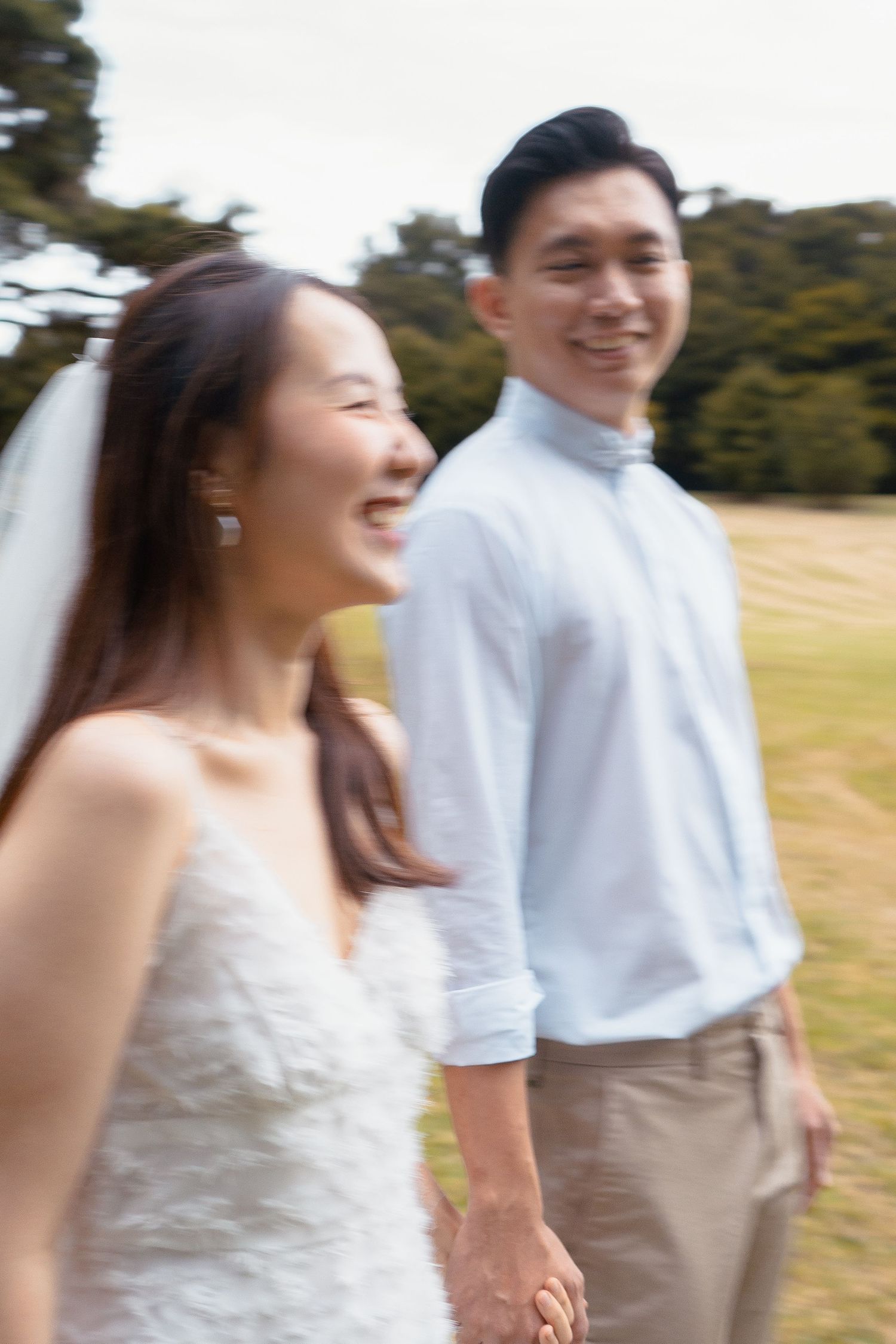 A joyful pre-wedding photoshoot at Auckland Botanical Gardens by YM Photography. Shot on digital and 35mm film.