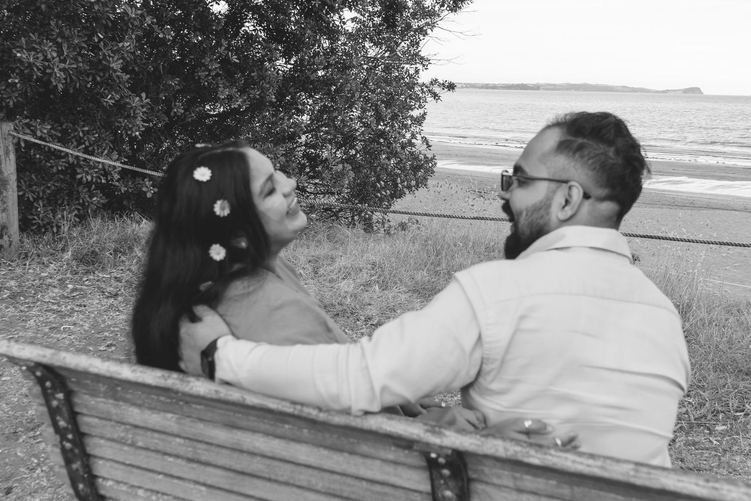 A magical maternity shoot during sunset at Long Bay Beach, Auckland.