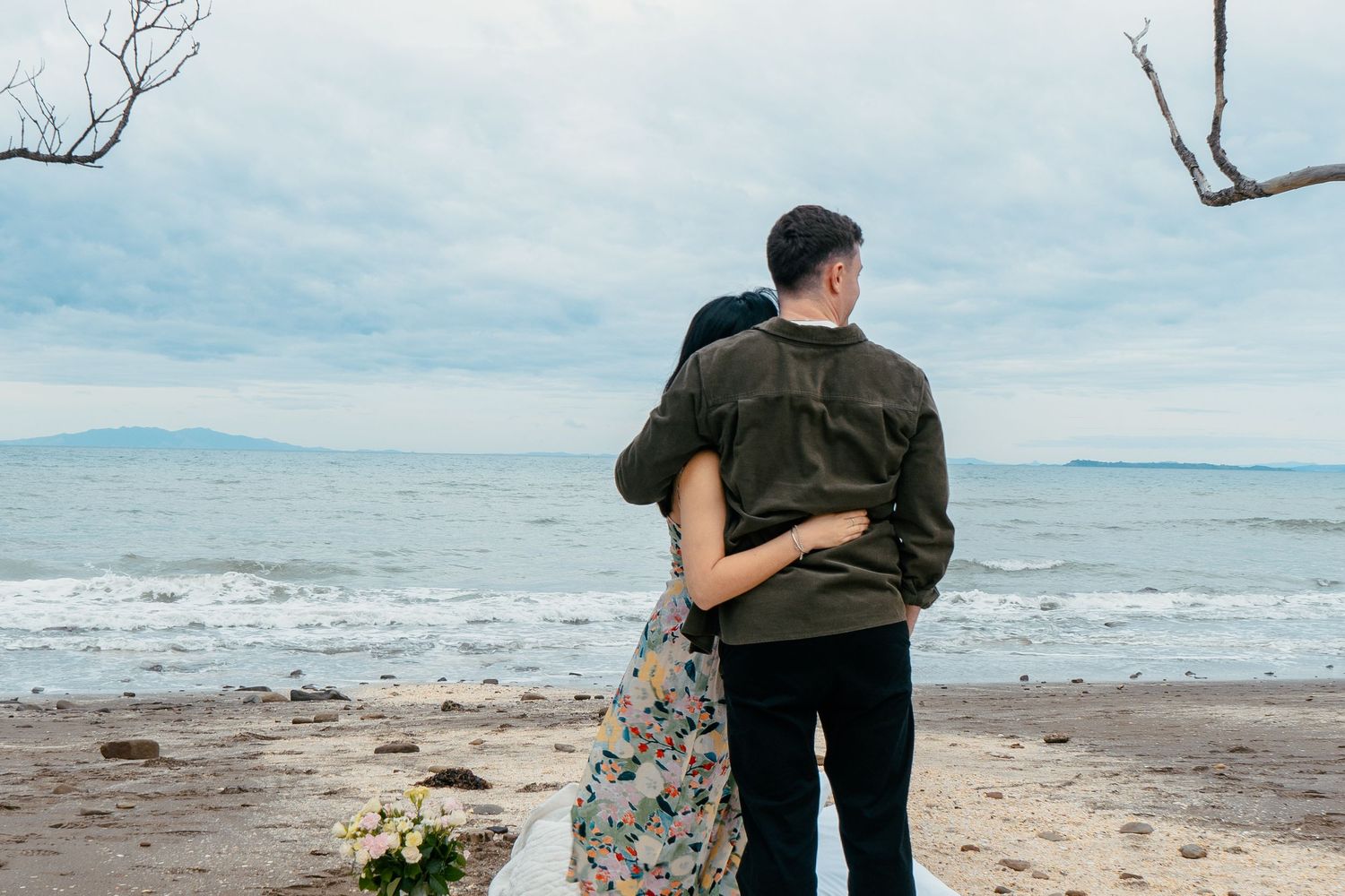 A sweet and romantic proposal at Granny's Bay, Auckland shot by YM Photography, A beautiful engagement session for the couple as well.