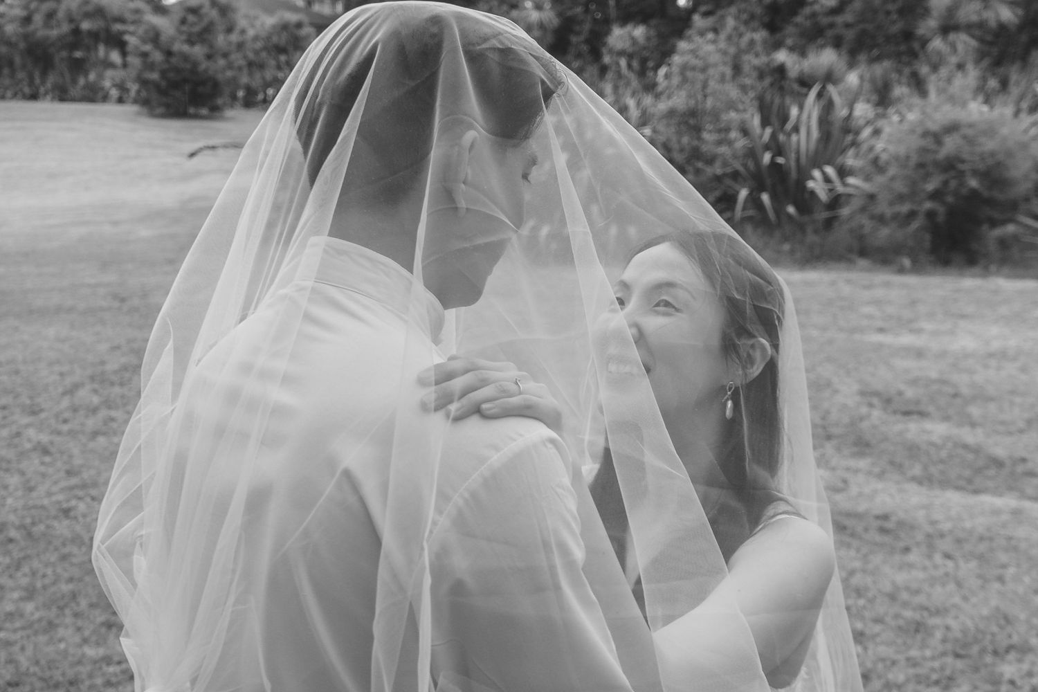 A joyful pre-wedding photoshoot at Auckland Botanical Gardens by YM Photography. Shot on digital and 35mm film.