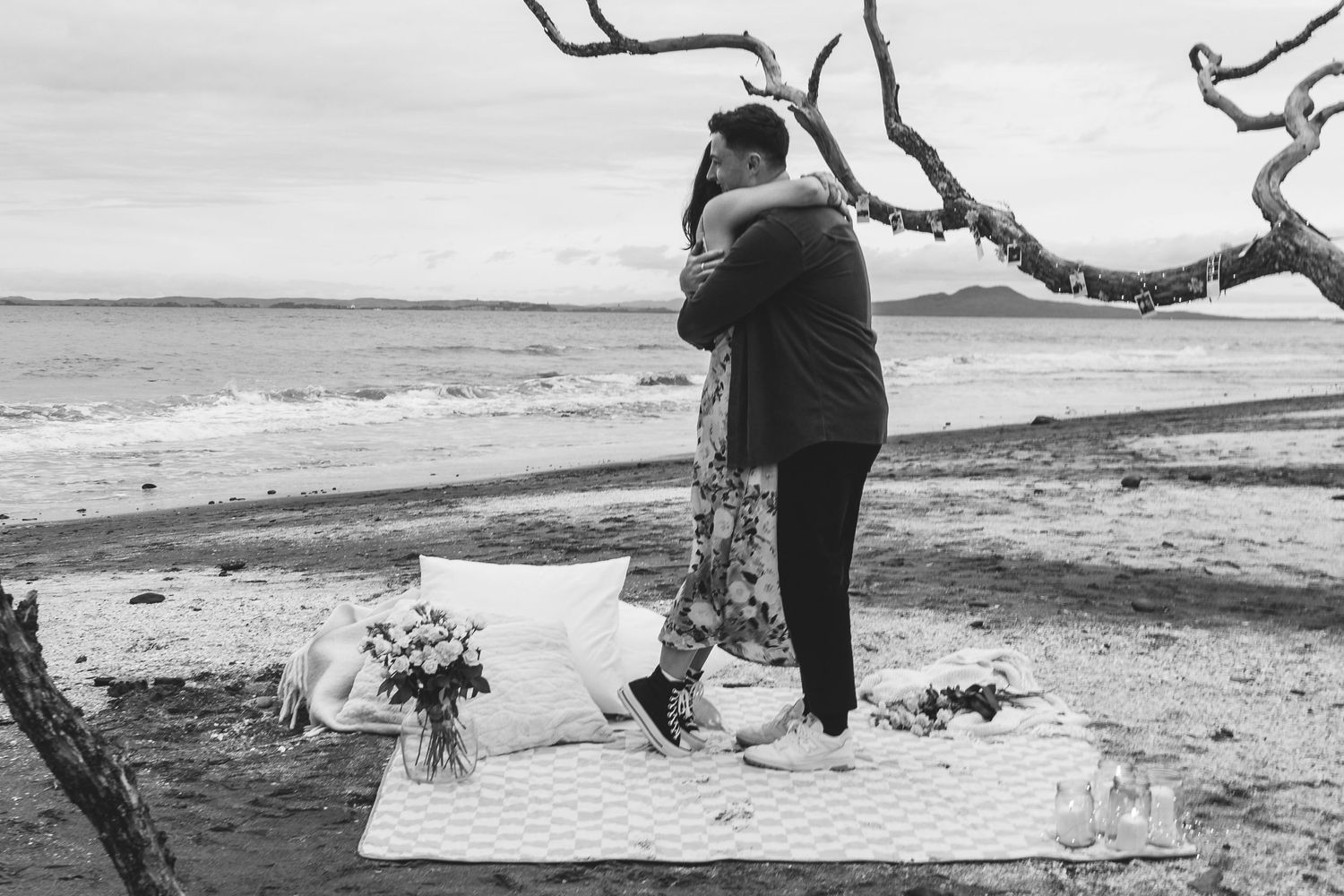 A sweet and romantic proposal at Granny's Bay, Auckland shot by YM Photography, A beautiful engagement session for the couple as well.