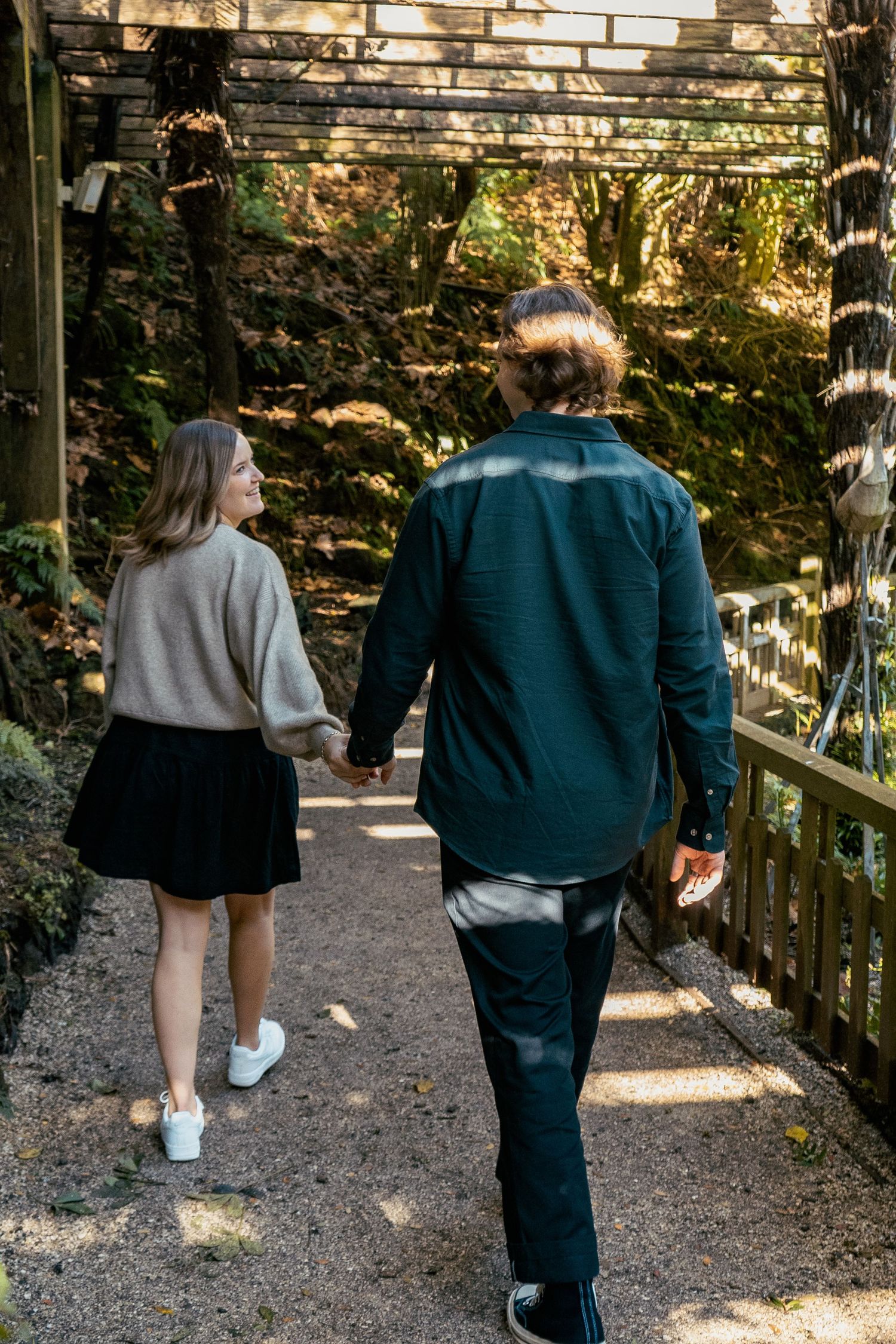 A romantic engagement shoot at the Fernery at Auckland Wintergardens by YM Photography.
