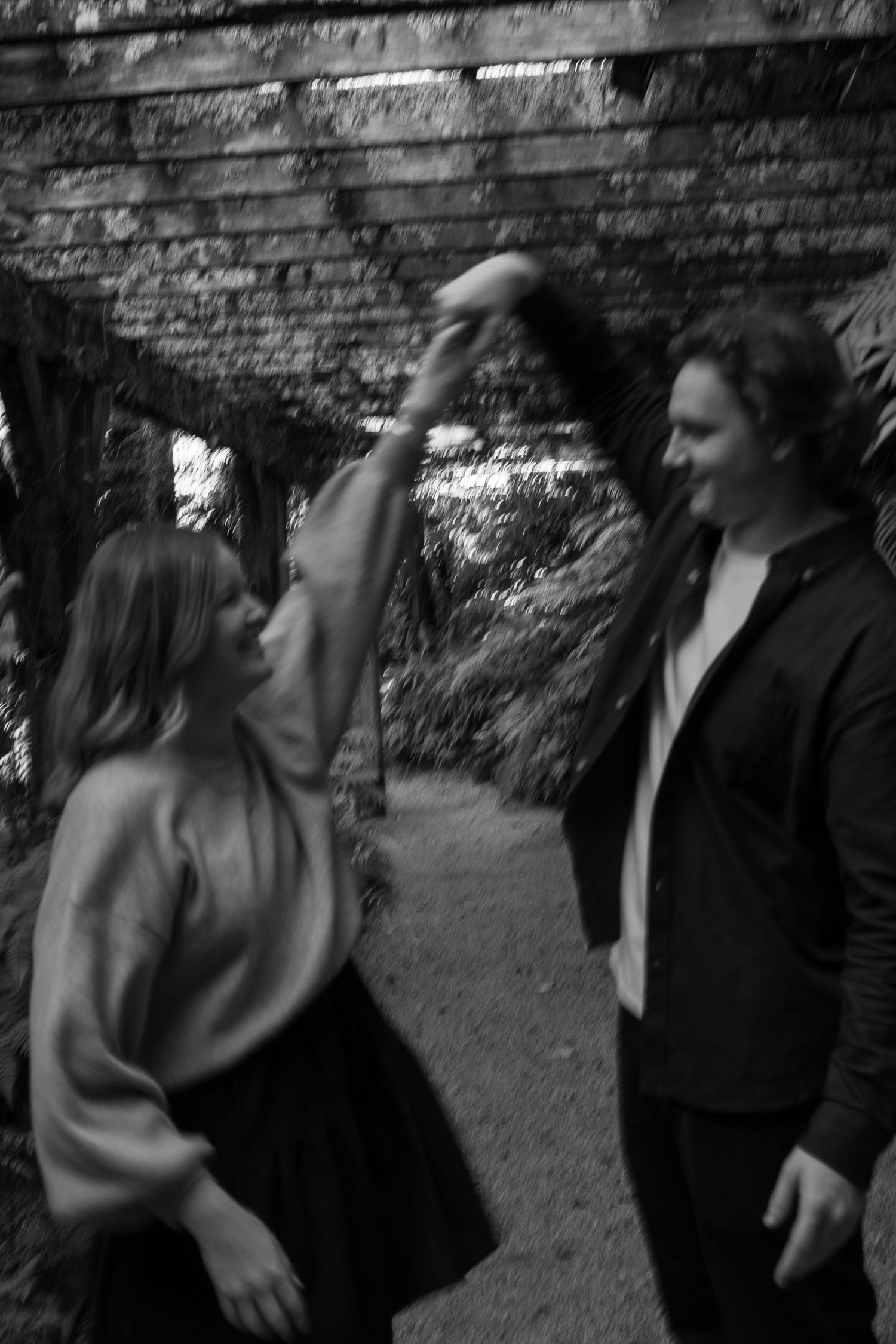 A romantic engagement shoot at the Fernery at Auckland Wintergardens by YM Photography.