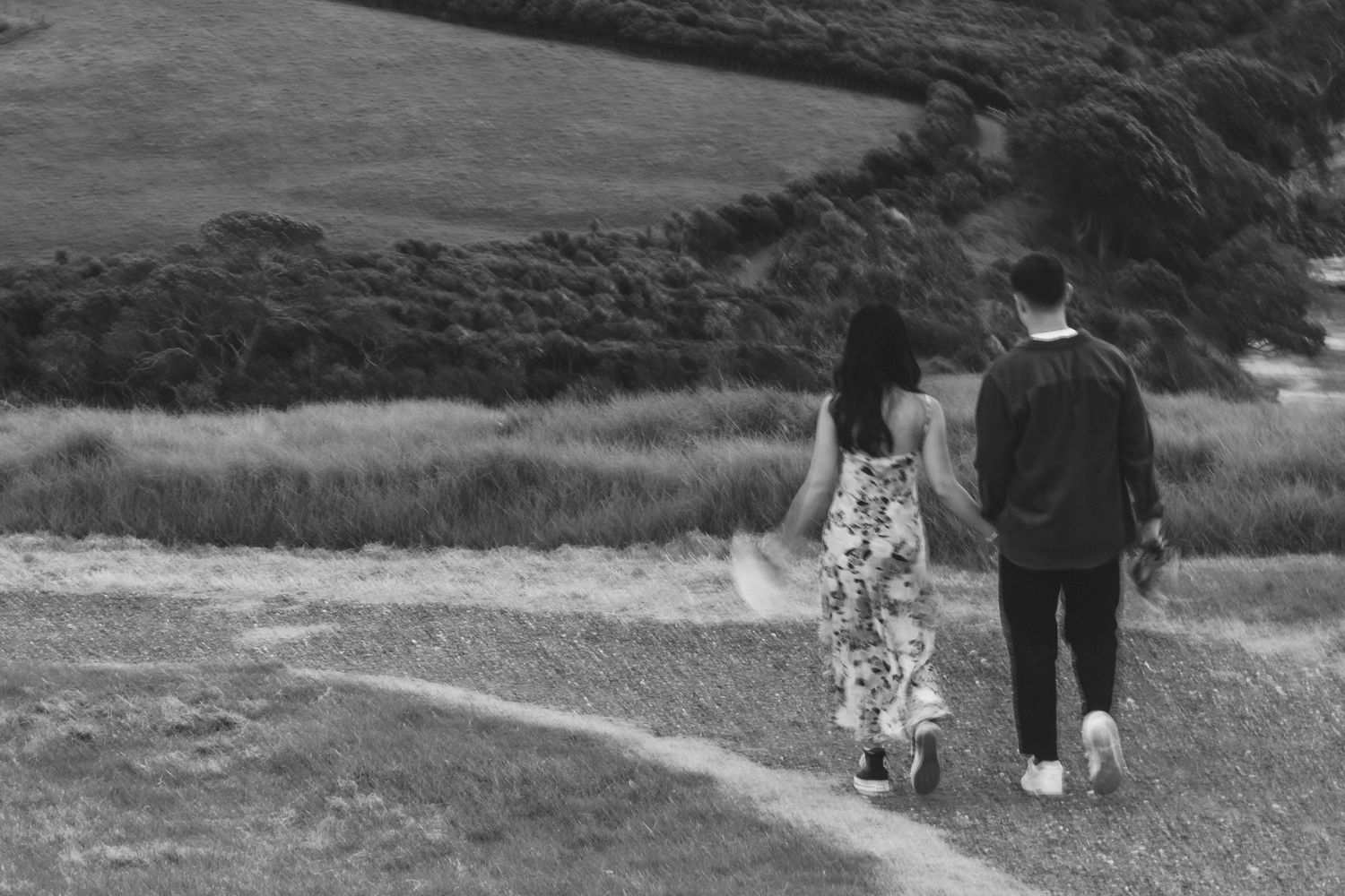 A sweet and romantic proposal at Granny's Bay, Auckland shot by YM Photography, A beautiful engagement session for the couple as well.