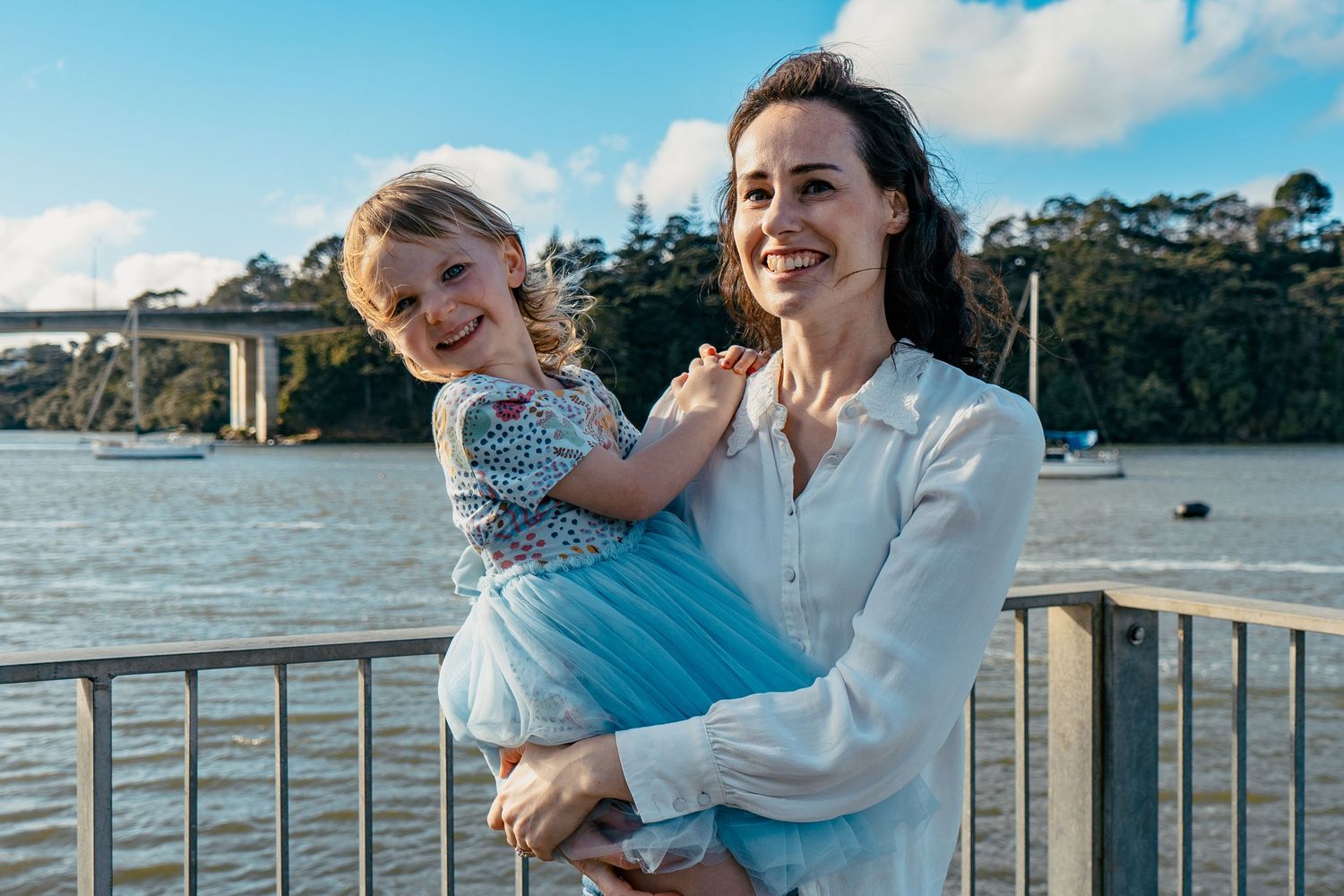 A family photoshoot at West Harbour, Auckland by YM Photography.