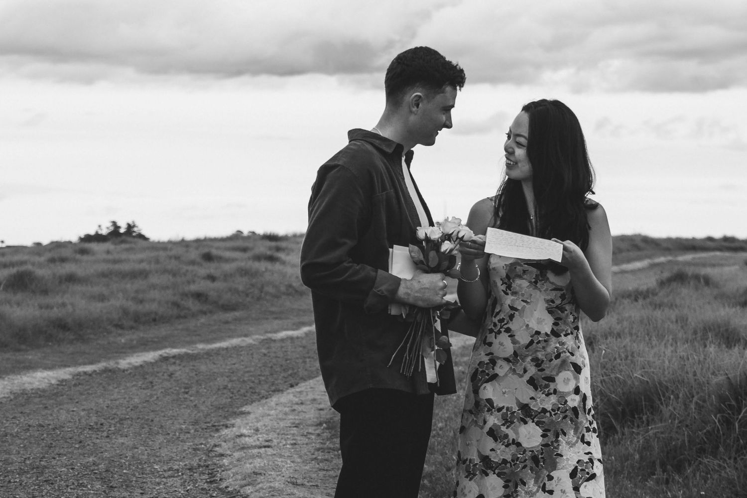 A sweet and romantic proposal at Granny's Bay, Auckland shot by YM Photography, A beautiful engagement session for the couple as well.