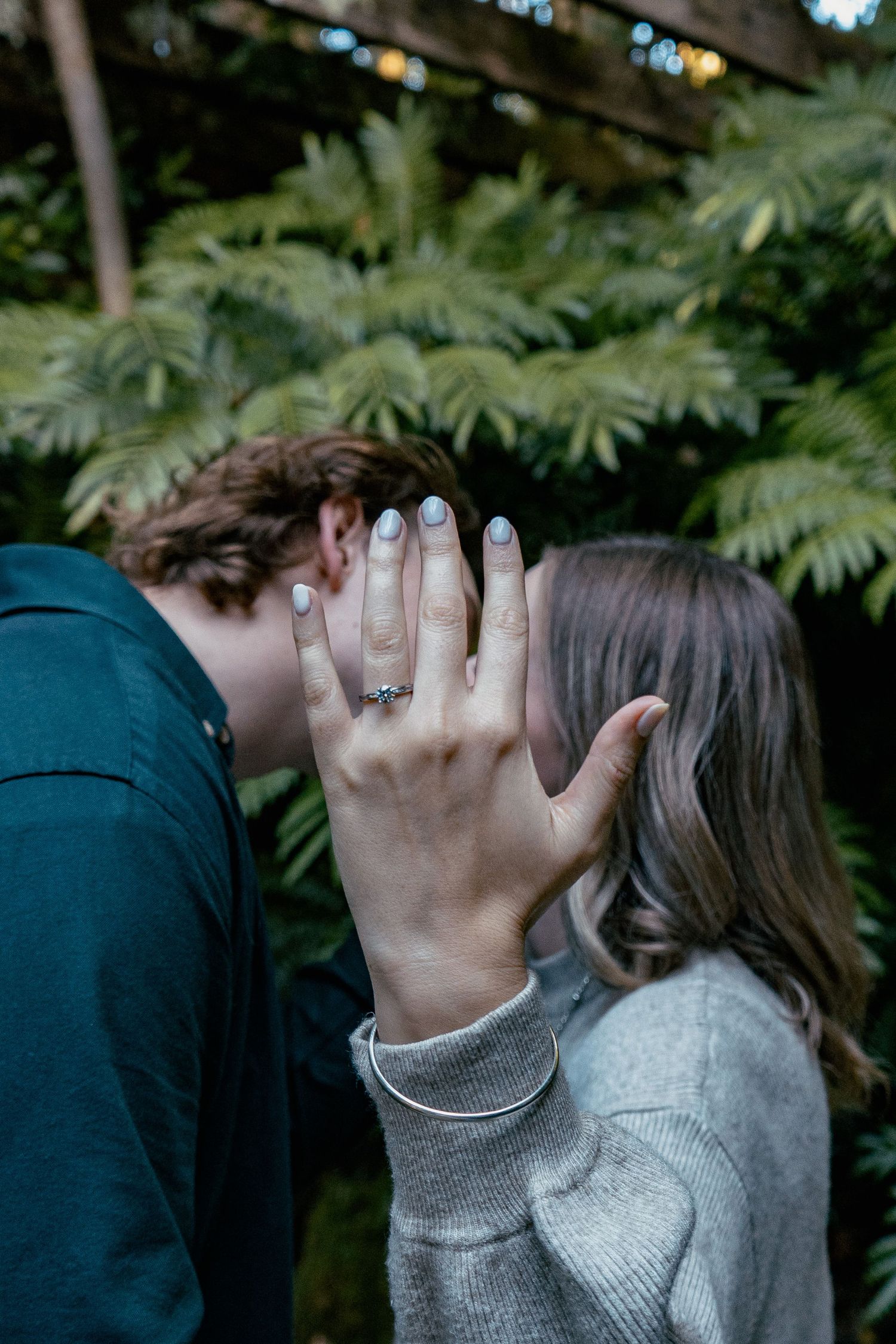A romantic engagement shoot at the Fernery at Auckland Wintergardens by YM Photography.