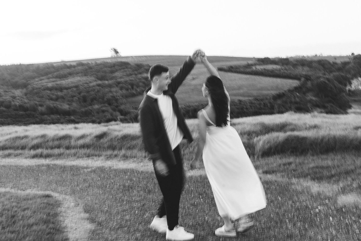 A sweet and romantic proposal at Granny's Bay, Auckland shot by YM Photography, A beautiful engagement session for the couple as well.