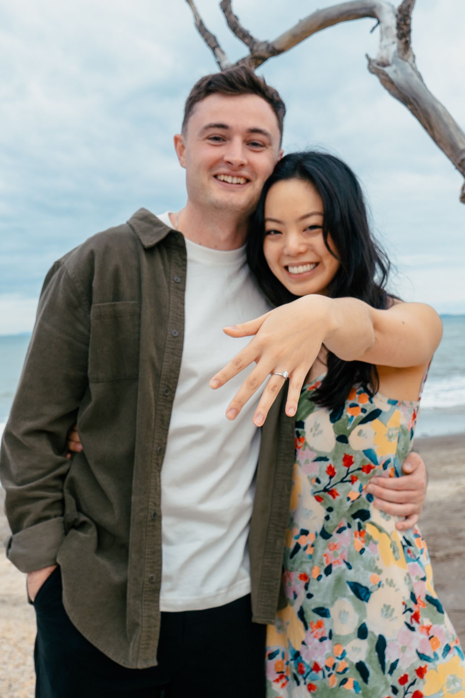 A sweet and romantic proposal at Granny's Bay, Auckland shot by YM Photography, A beautiful engagement session for the couple as well.