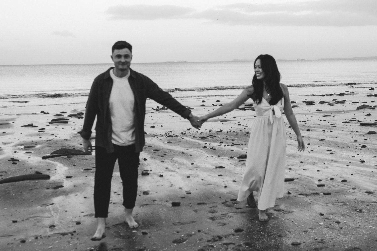 A sweet and romantic proposal at Granny's Bay, Auckland shot by YM Photography, A beautiful engagement session for the couple as well.