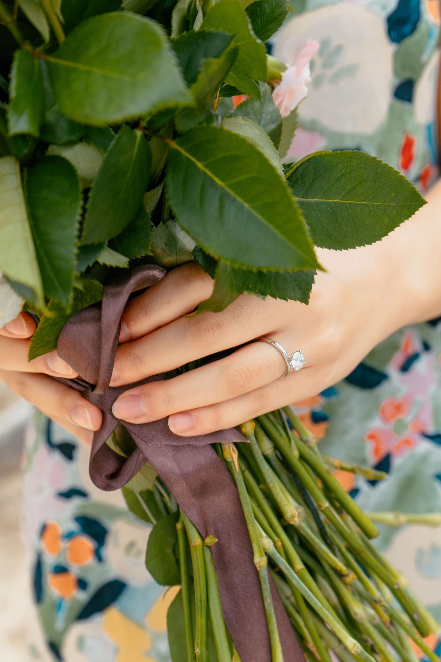 A sweet and romantic proposal at Granny's Bay, Auckland shot by YM Photography, A beautiful engagement session for the couple as well.