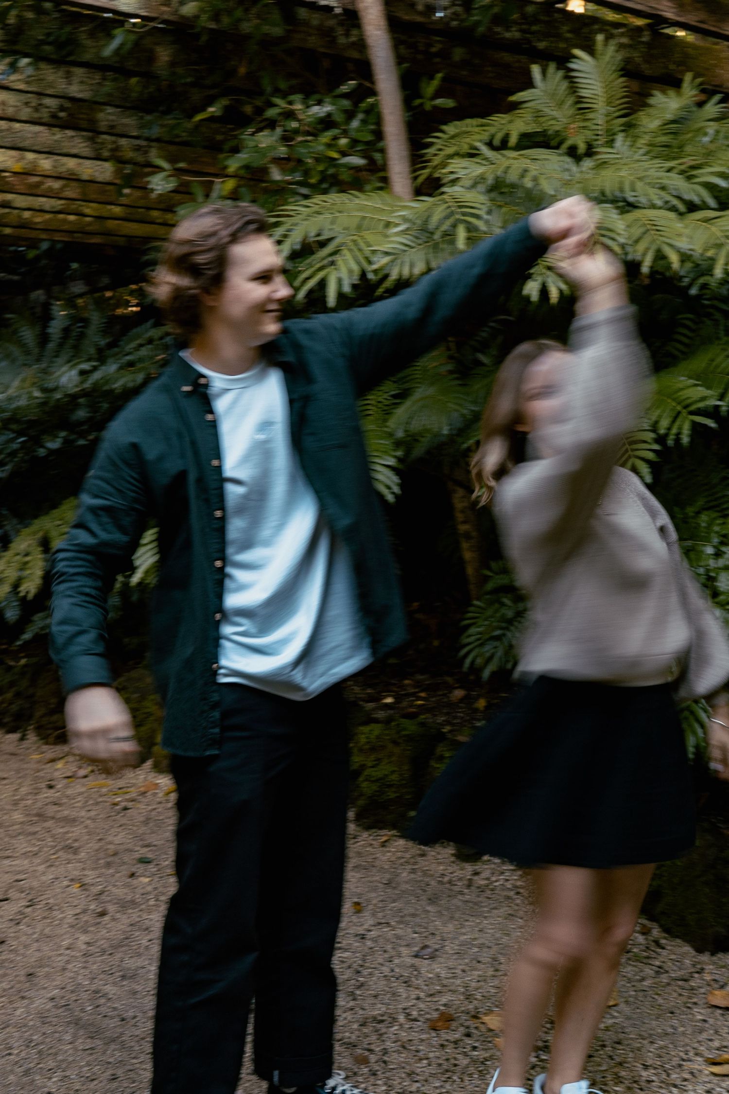 A romantic engagement shoot at the Fernery at Auckland Wintergardens by YM Photography.
