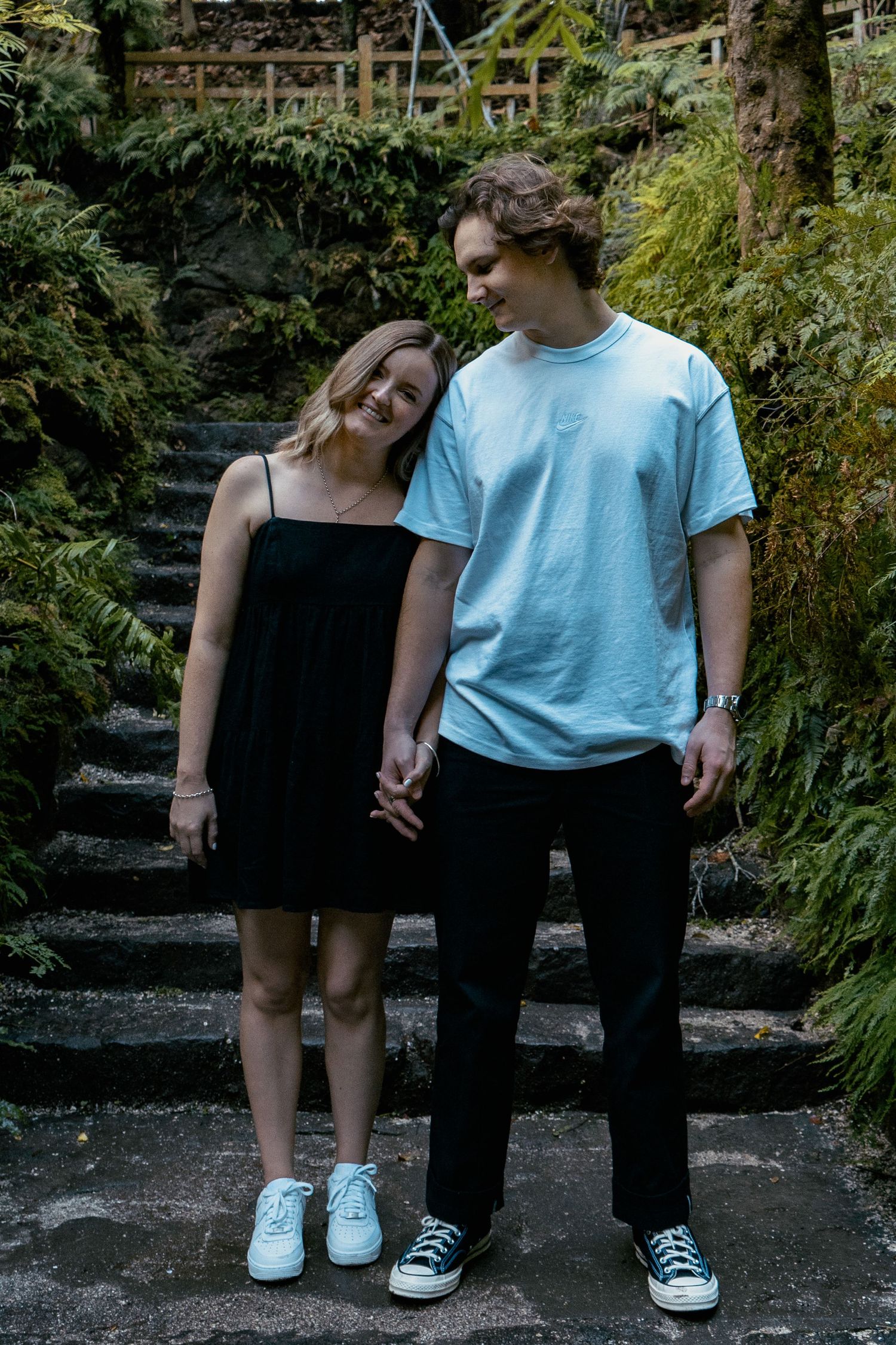 A romantic engagement shoot at the Fernery at Auckland Wintergardens by YM Photography.