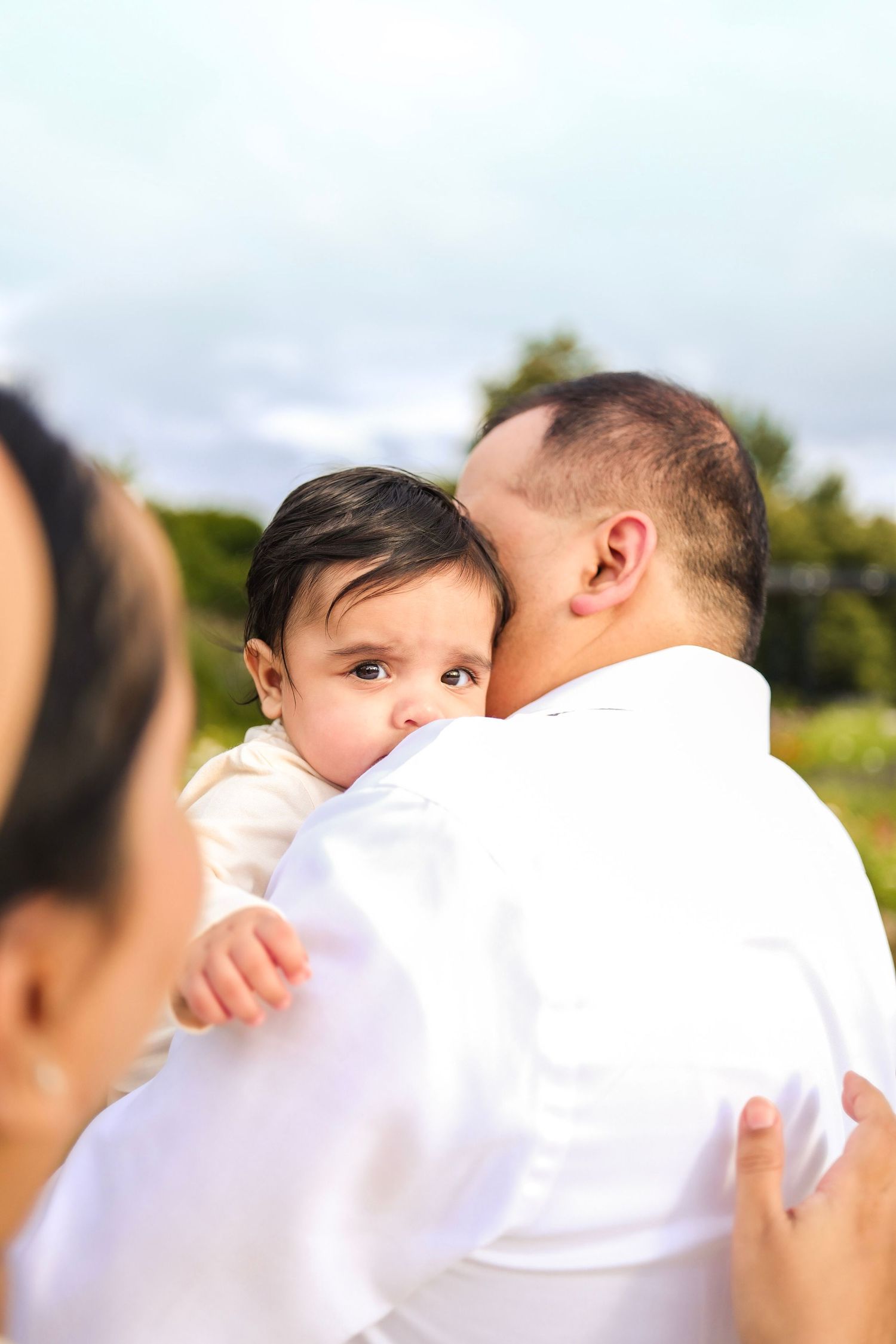 Tender family moment outdoors with baby. toronto photographer, greater toronto area, family, majestystudios by Nadia, family portraits